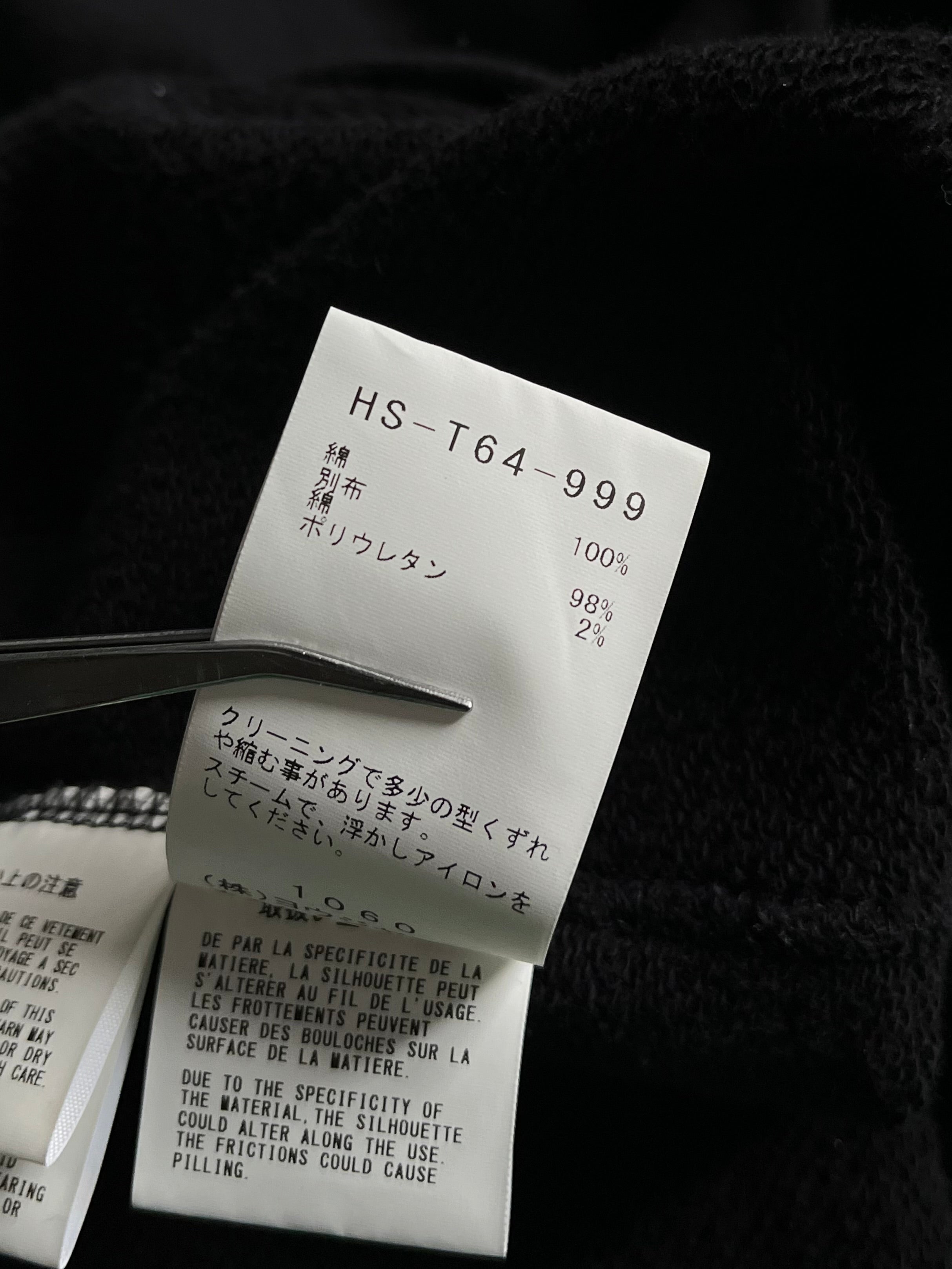 Yohji Yamamoto SS24 black signature hoodie with minimalist design, featuring the brand’s logo on the front, casual and stylish.