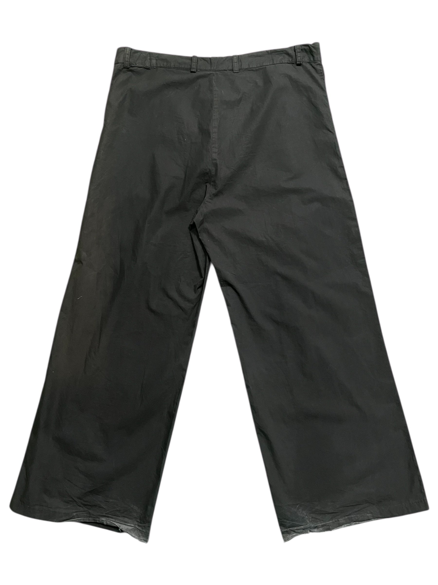 Raf Simons SS04 "May The Circle Be Unbroken" zombie pants featuring distressed fabric and unique design details.