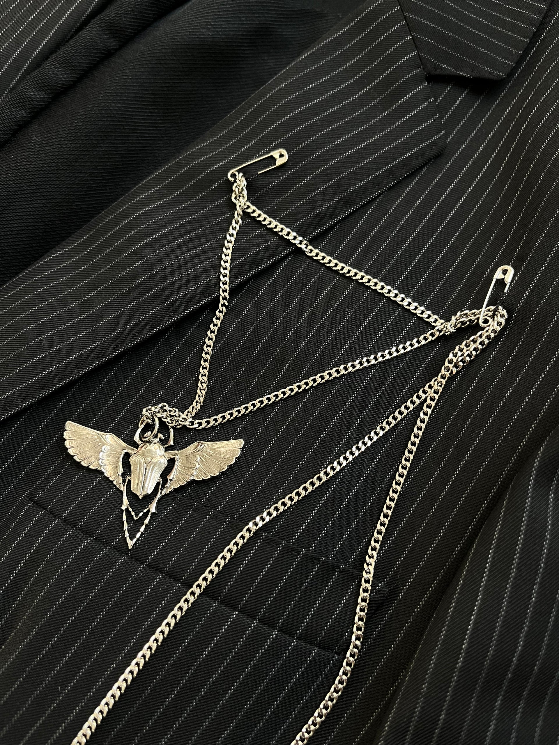 Balmain SS11 Scarab Medal blazer jacket with intricate details and structured fit, stylishly displayed on a neutral background.