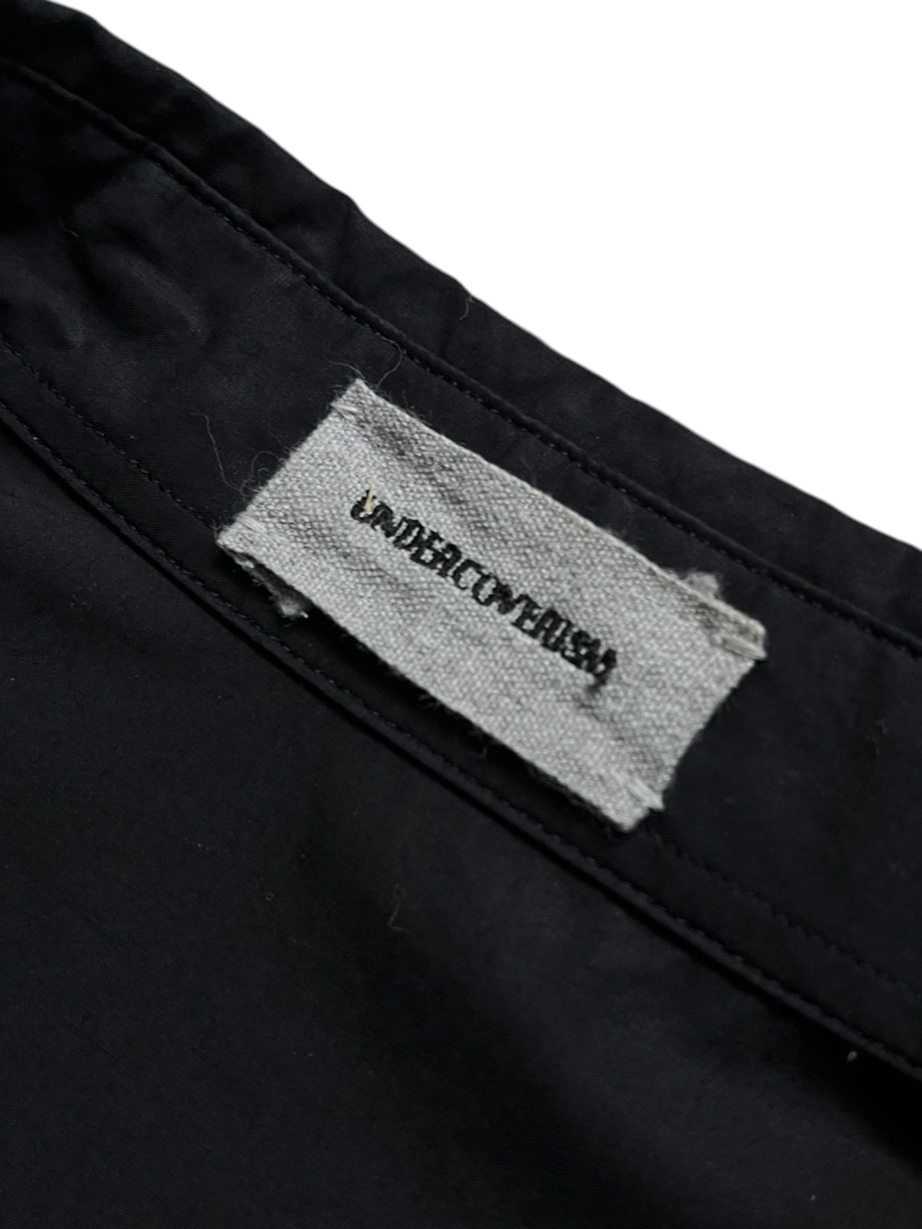 Undercover SS12 Openstrings She Brings The Rain shirt featuring a lightweight, stylish design with open string details.