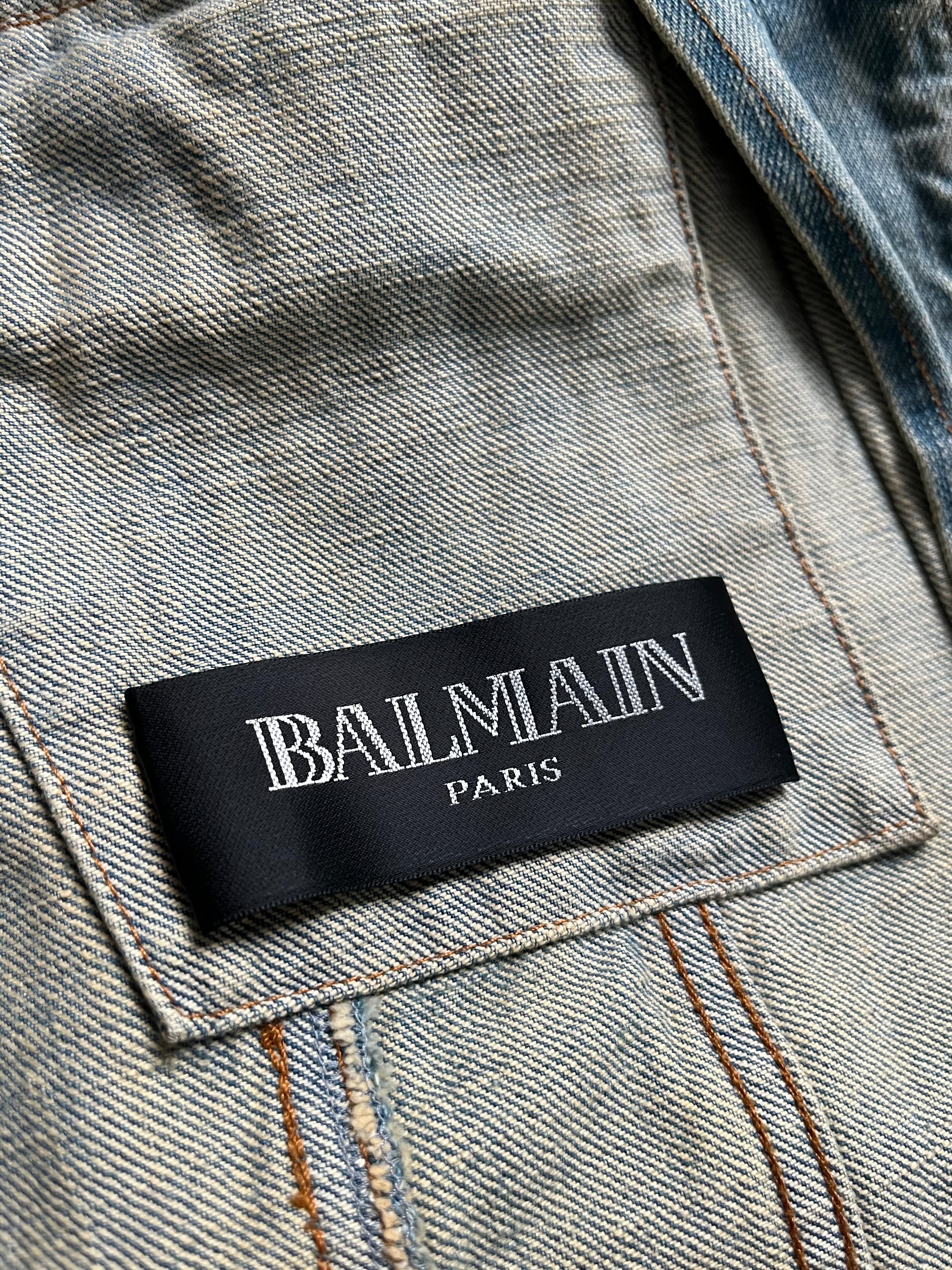 Balmain SS12 G-Dragon Mud Wash Denim Jacket displayed front view with distressed details and classic denim styling