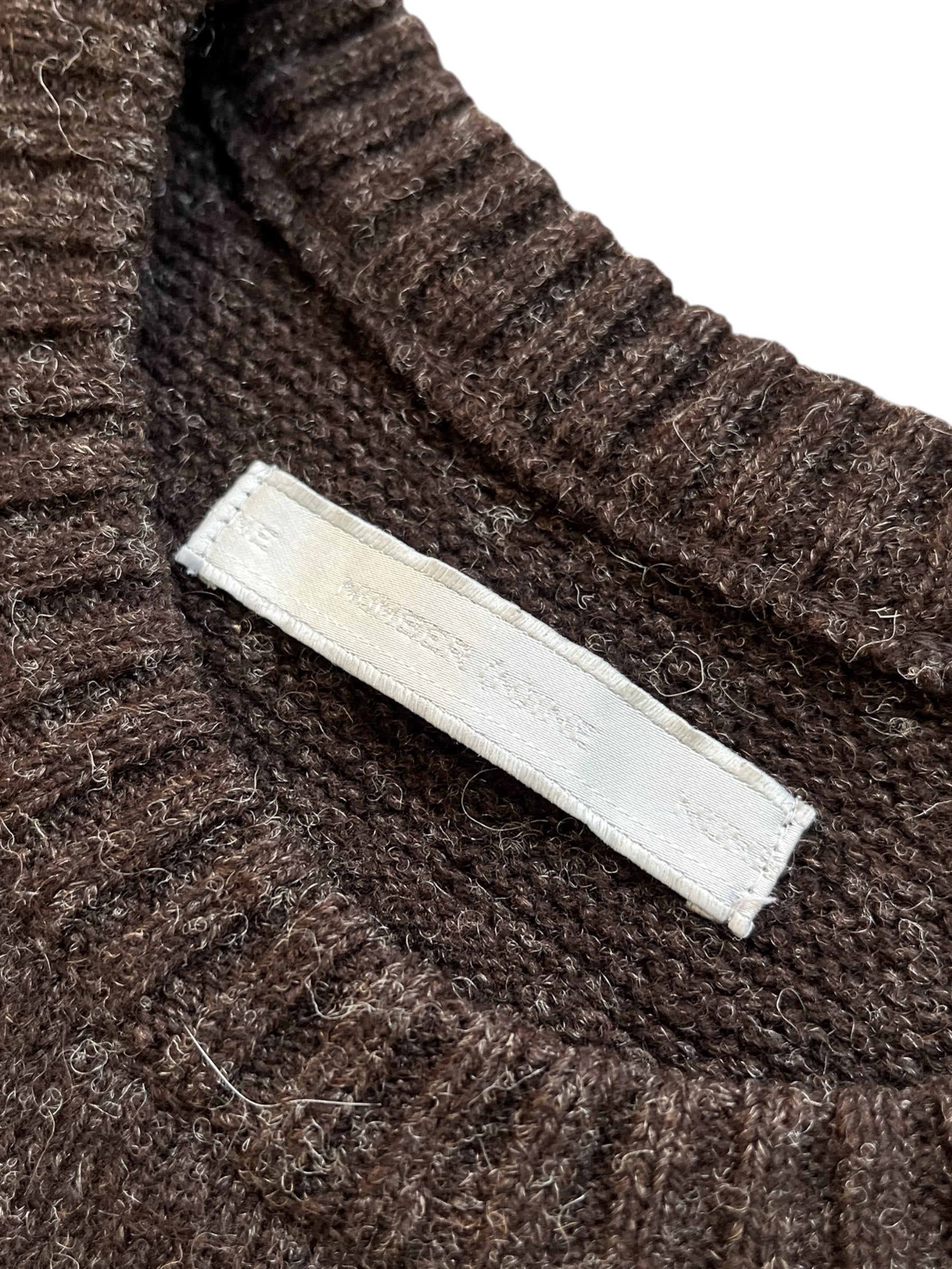 Number (N)ine AW02 “Nowhere Man” reindeer wool knit sweater, close-up showing textured knit pattern and cozy winter style.