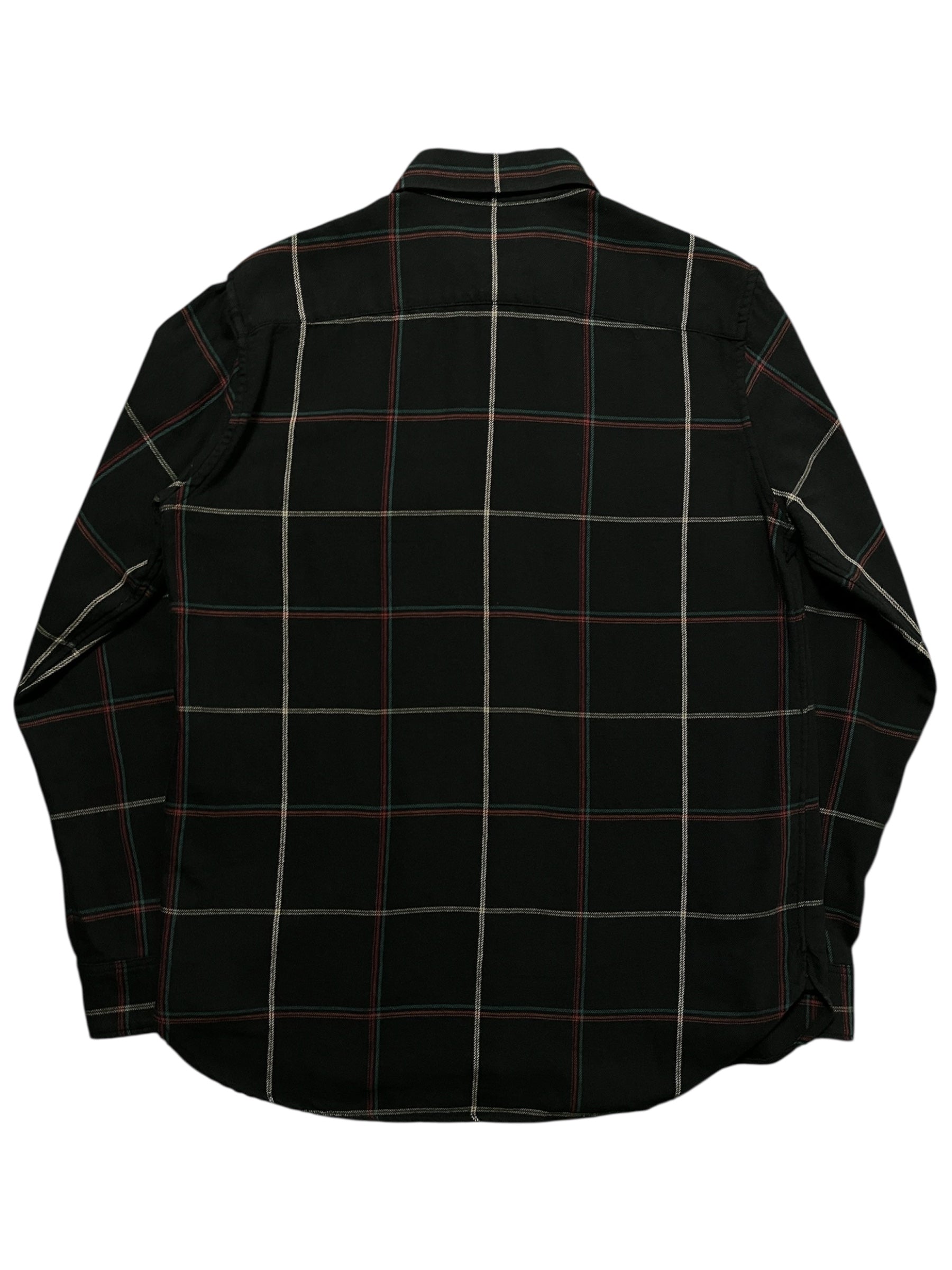 Saint Laurent AW18 navy plaid flannel shirt with classic pattern and button-down design, shown hanging on a wooden hanger.