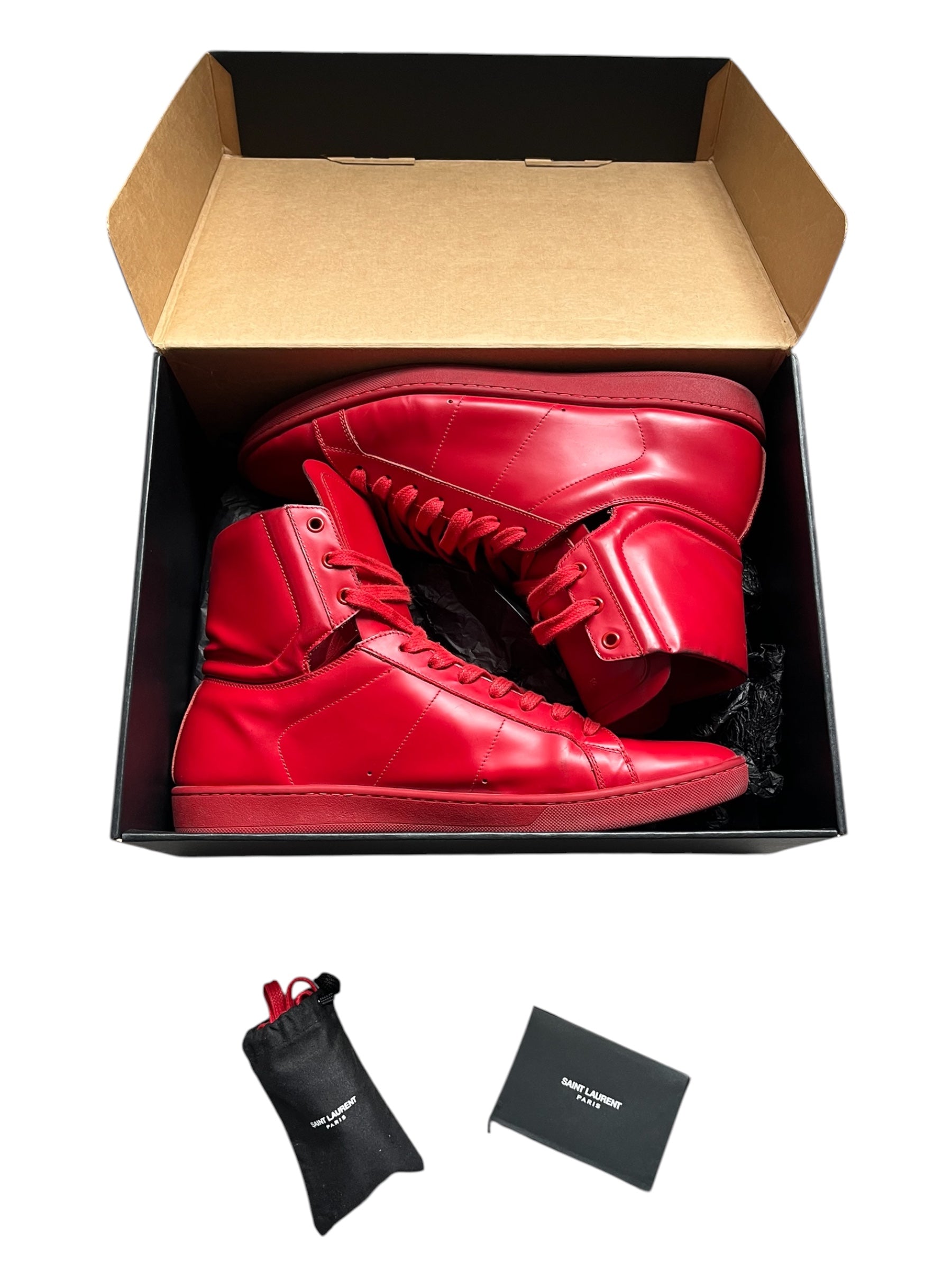 Saint Laurent AW16 Court Classic SL/01H high top sneakers in black leather with white rubber soles, detailed view of stylish shoes.