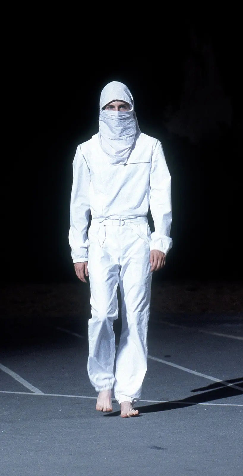 Raf Simons SS02 "Woe Onto Those" red boiler suit coverall with front zipper and shoulder pockets, casual and edgy fashion piece