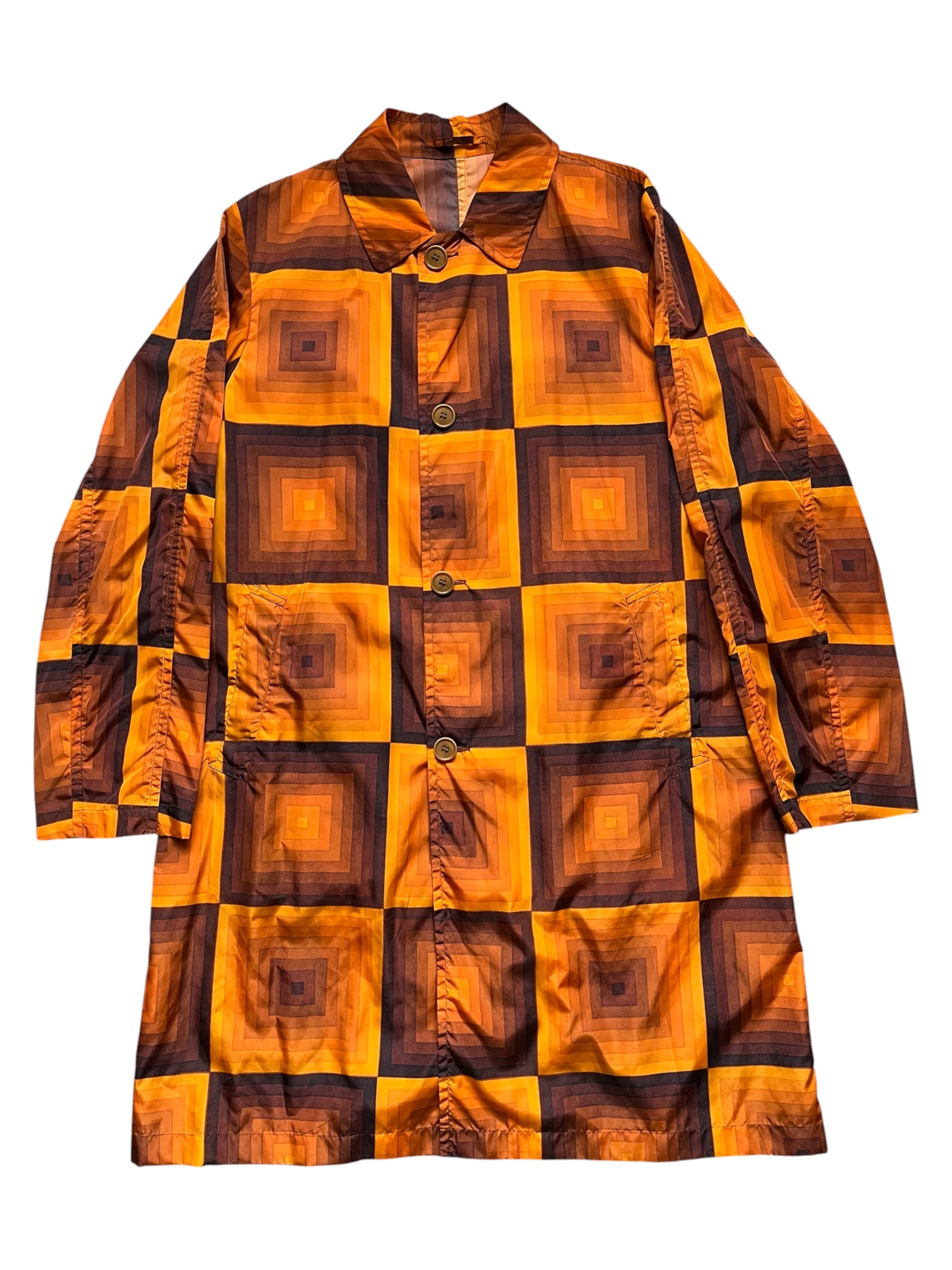 Dries Van Noten SS19 Verner Panton nylon coat displayed on a hanger with a sleek, modern design in a neutral color