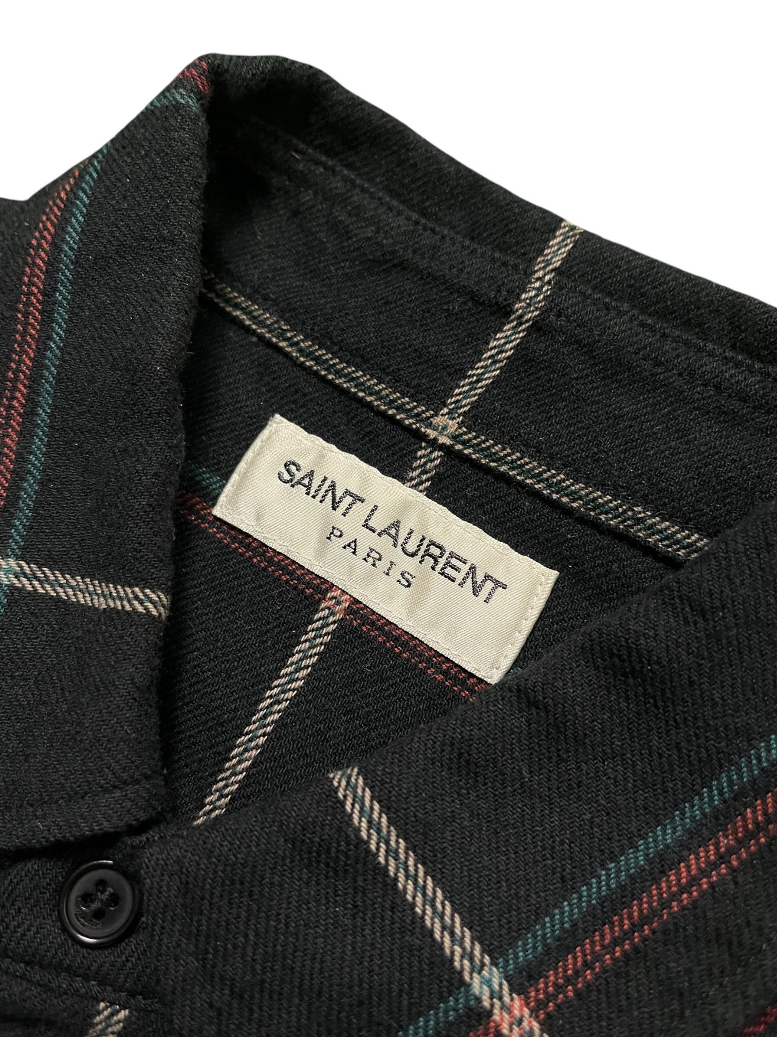 Saint Laurent navy plaid flannel shirt with a classic checkered pattern, featuring a button-up front and collar.