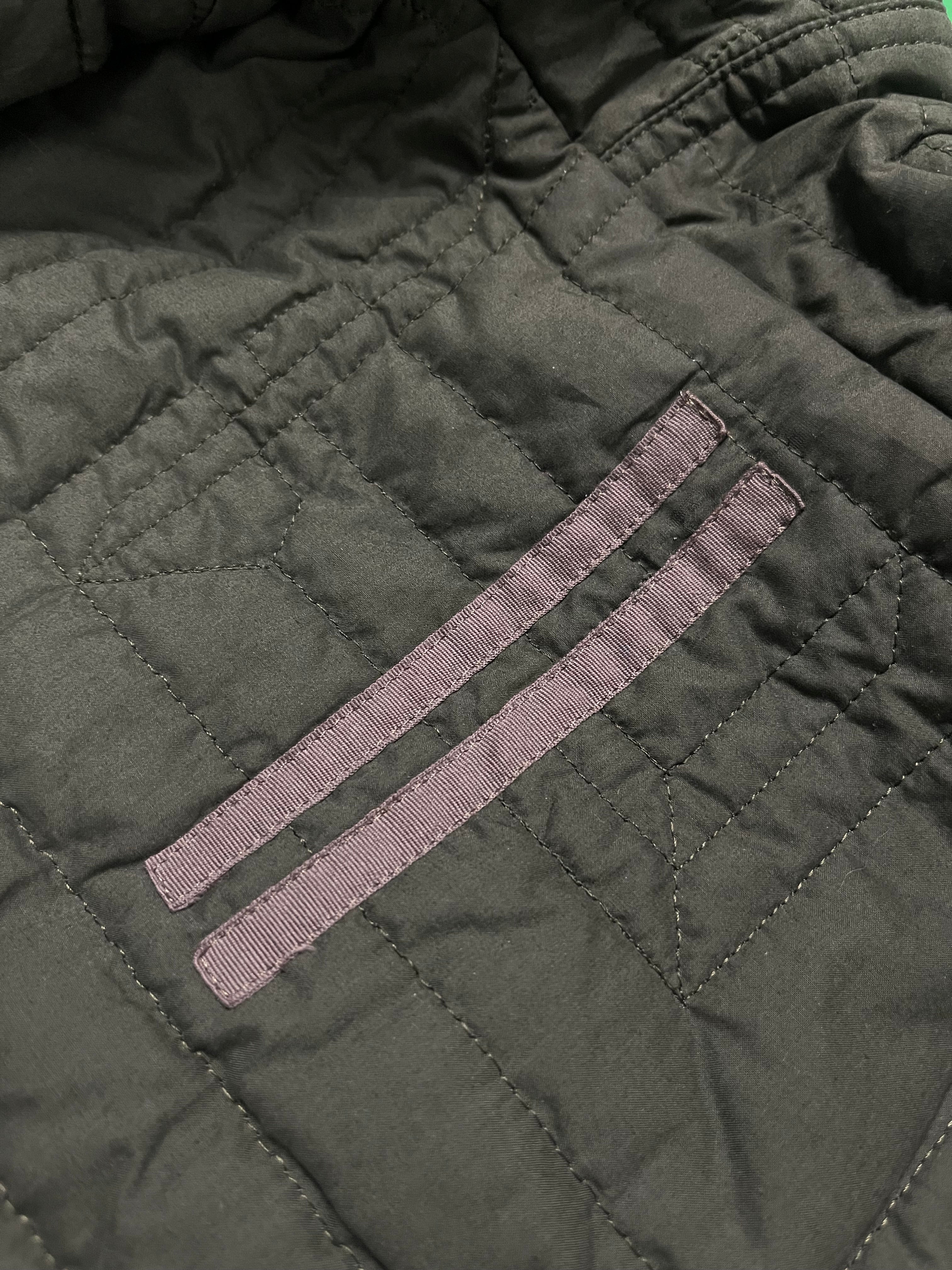 Rick Owens FW16 DRKSHDW Exploder bomber jacket with black fabric, ribbed cuffs, and front zipper closure.