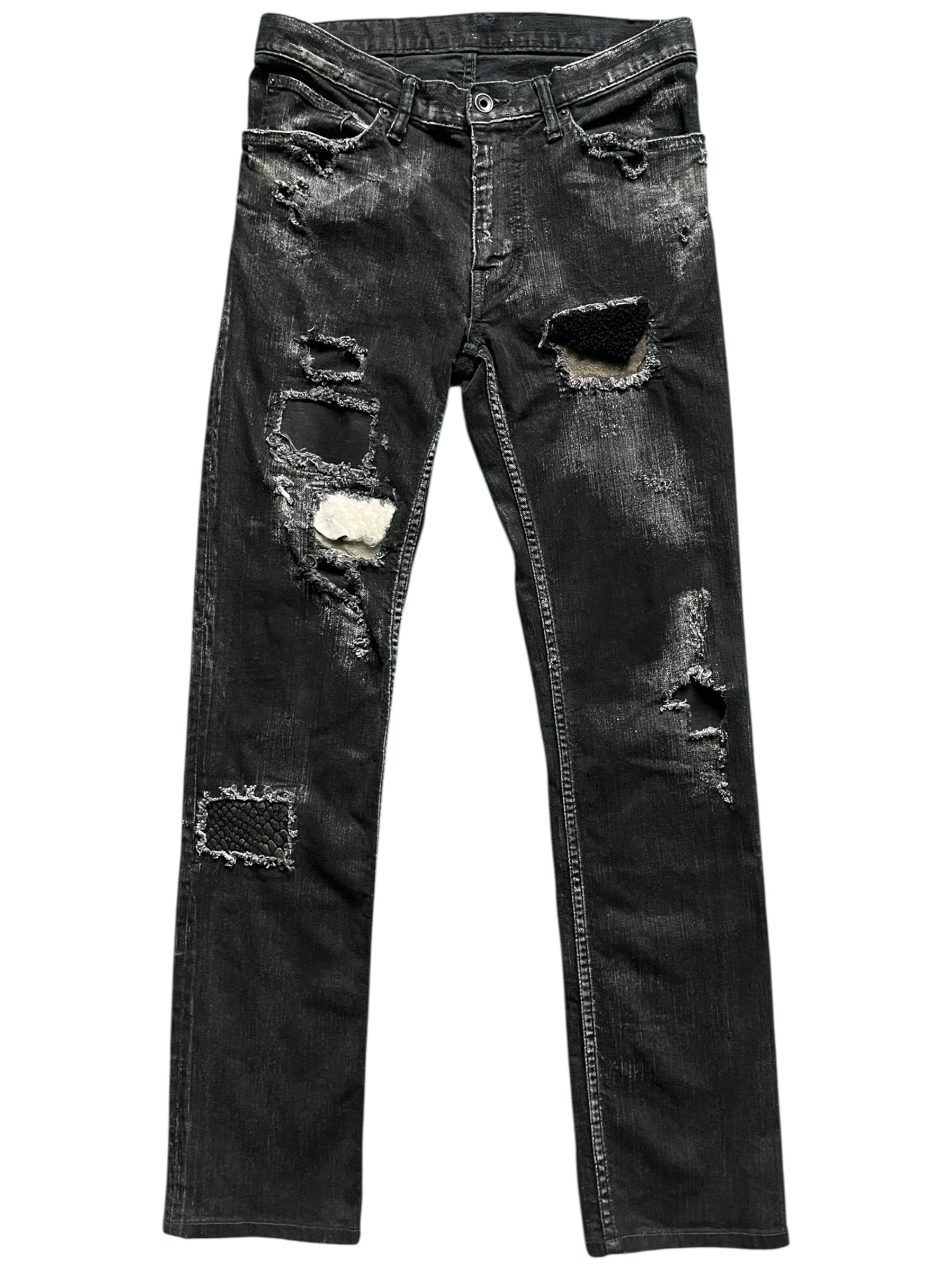 Le Grande Bleu 00s Wolf Cut waxed distressed denim pants with rugged, faded detailing and a vintage-inspired fit.