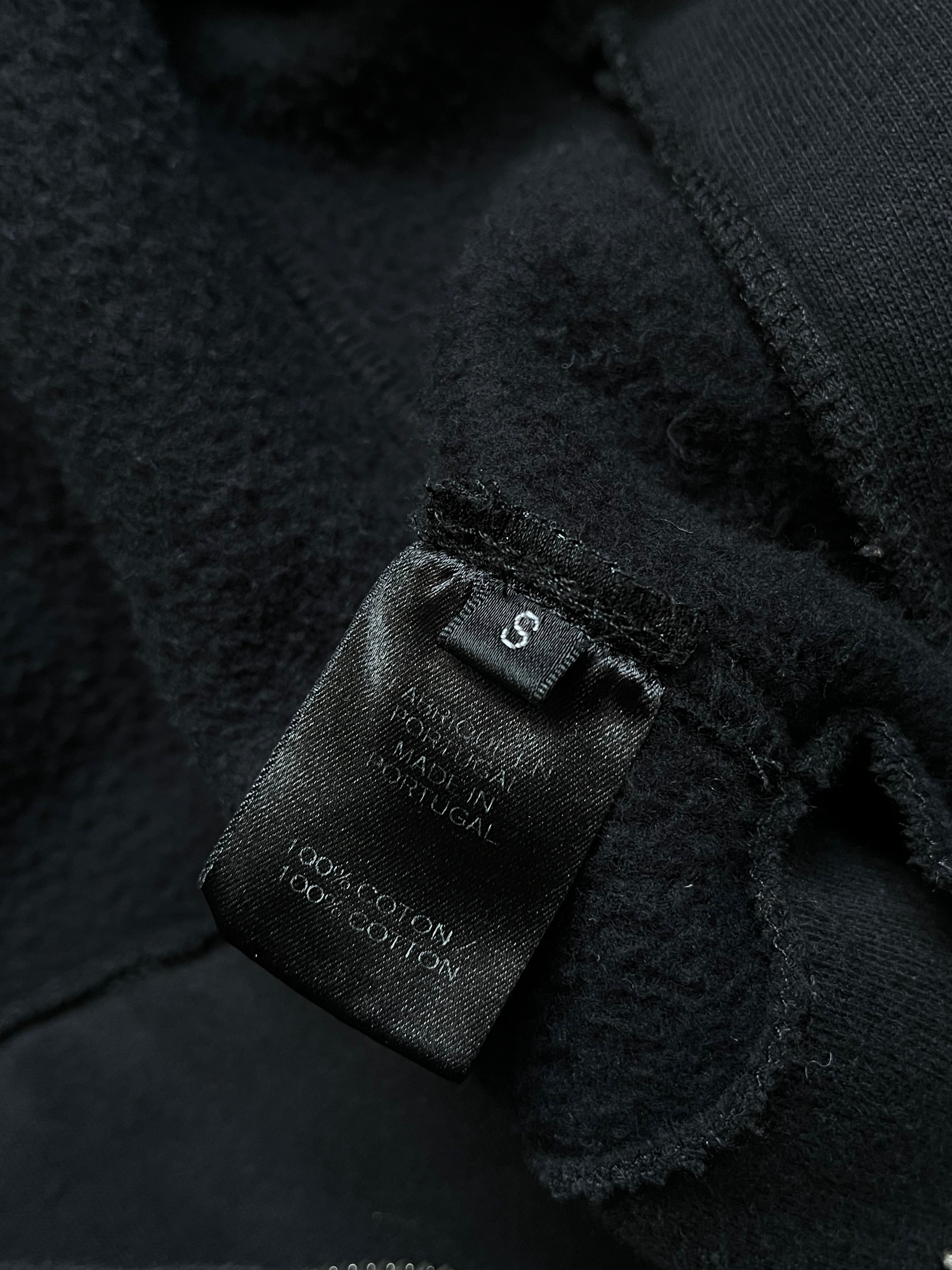 Balmain SS14 sweater biker jacket with structured design, featuring a sleek silhouette and detailed stitching.