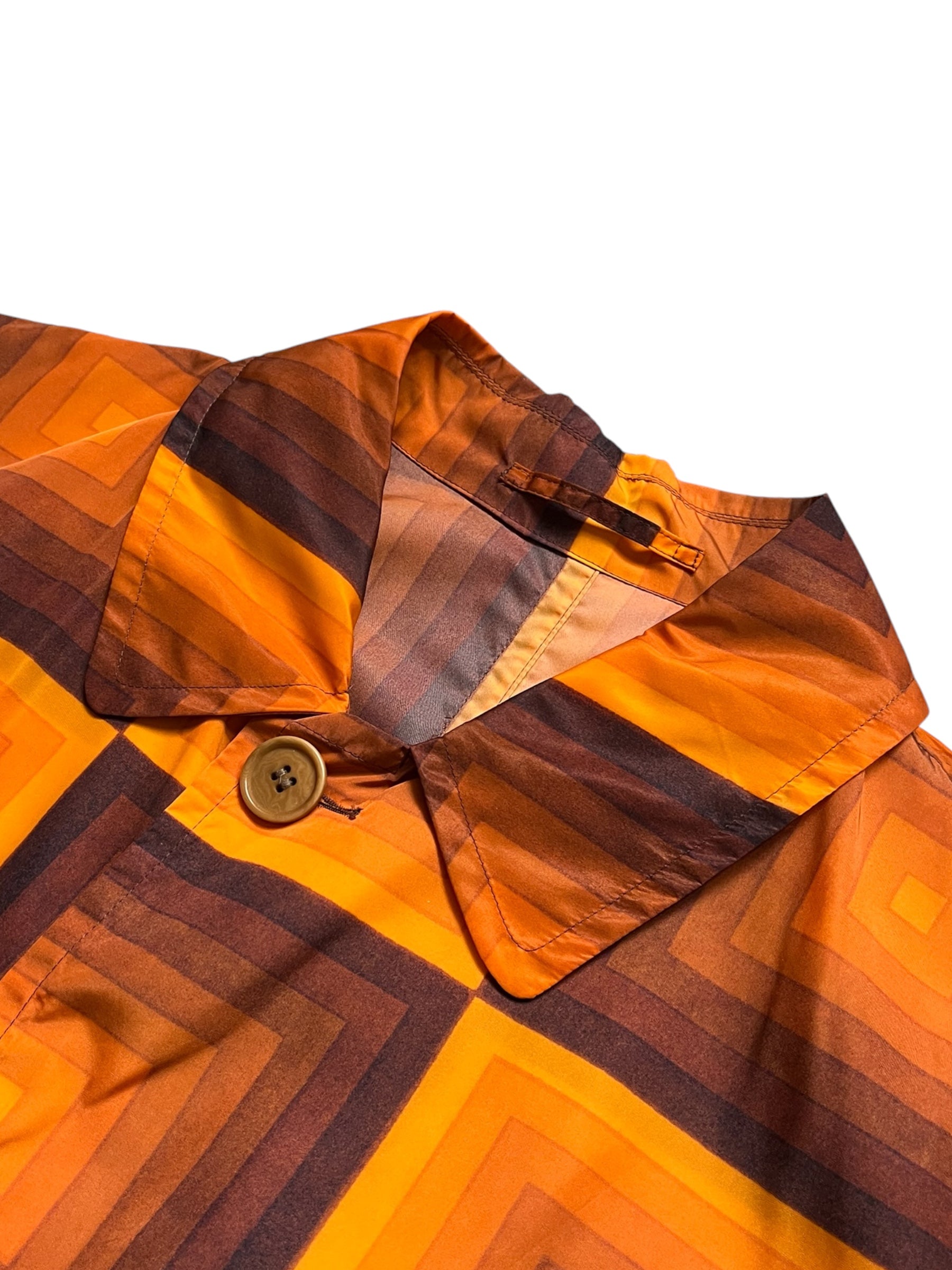 Dries Van Noten SS19 Verner Panton nylon coat in vibrant color, shown with full front view and detailed fabric texture.
