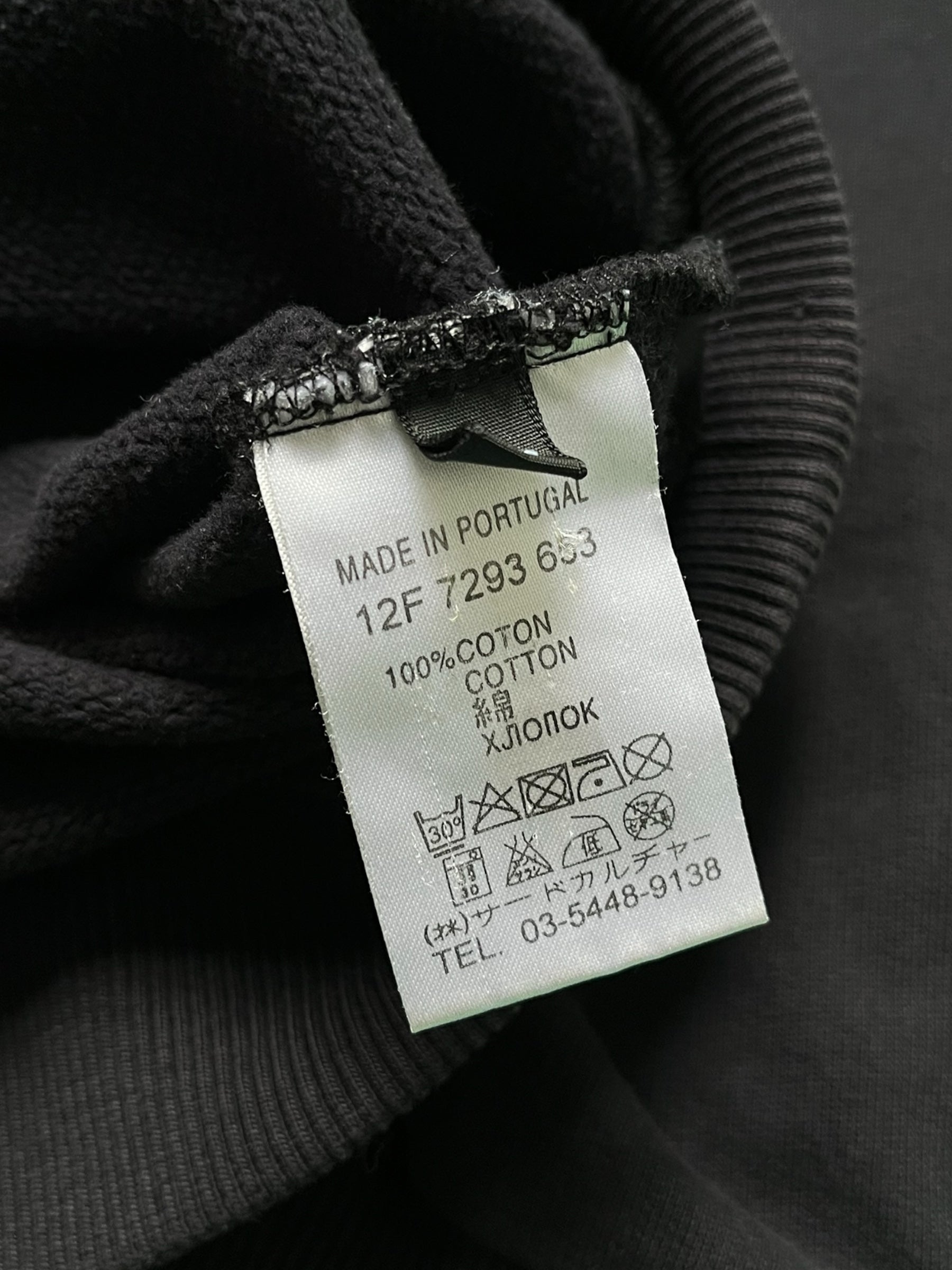Black Givenchy FW12 Rottweiler crewneck sweatshirt with graphic design, casual style, and comfortable fit.