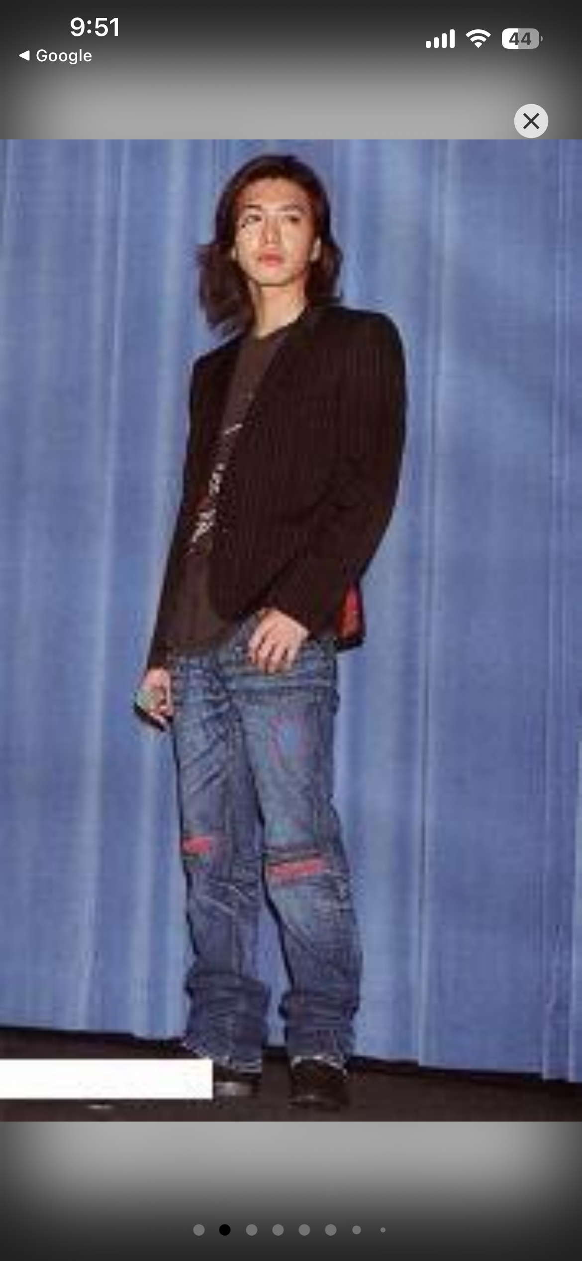 Distressed denim pants from Number (N)ine's SS05 “Nightcrawler” collection, showcasing ripped details and a relaxed fit.