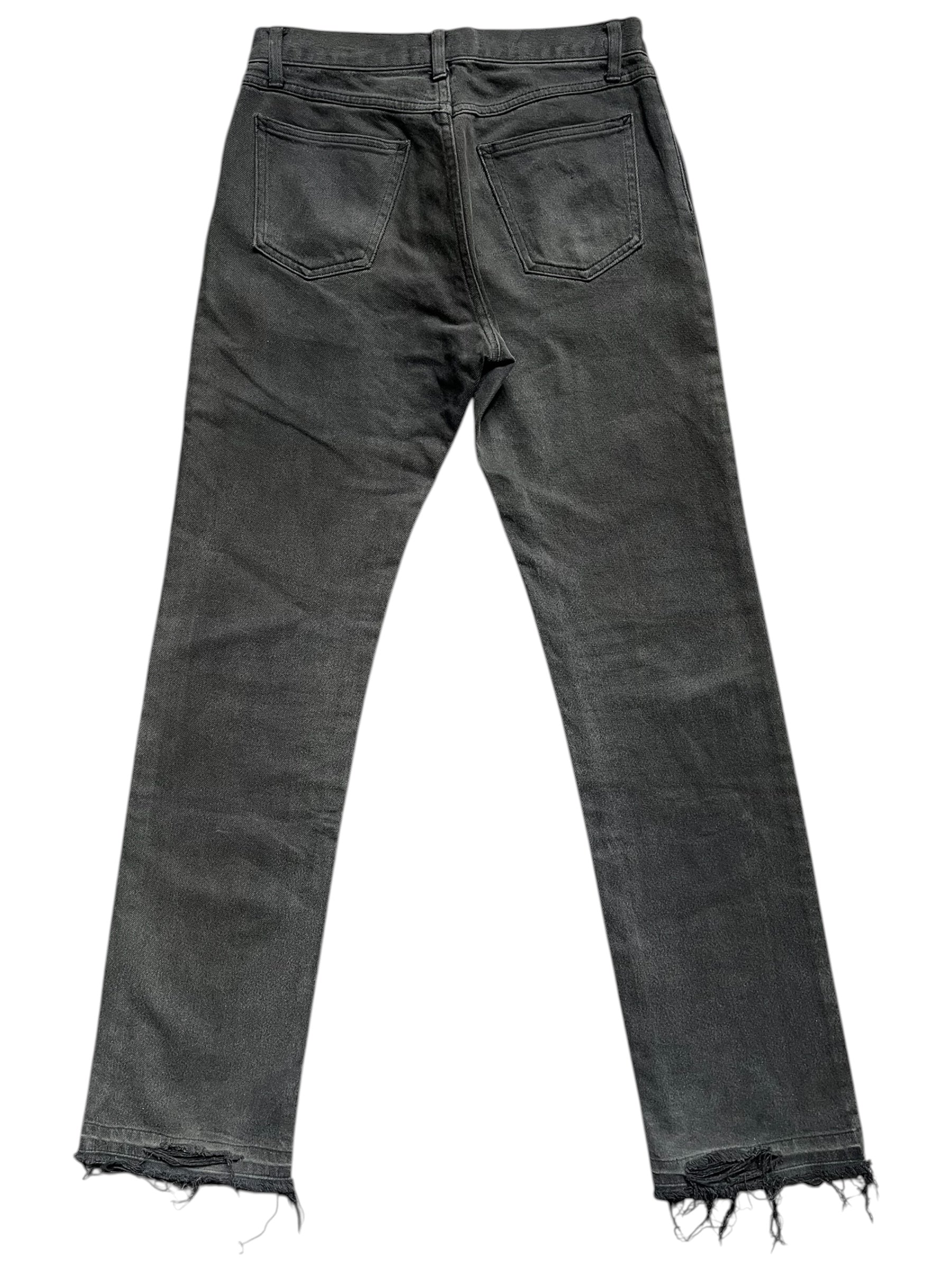 Number (N)ine AW01 "Standards" grey faded denim pants, showcasing relaxed fit and distressed style in a natural pose.