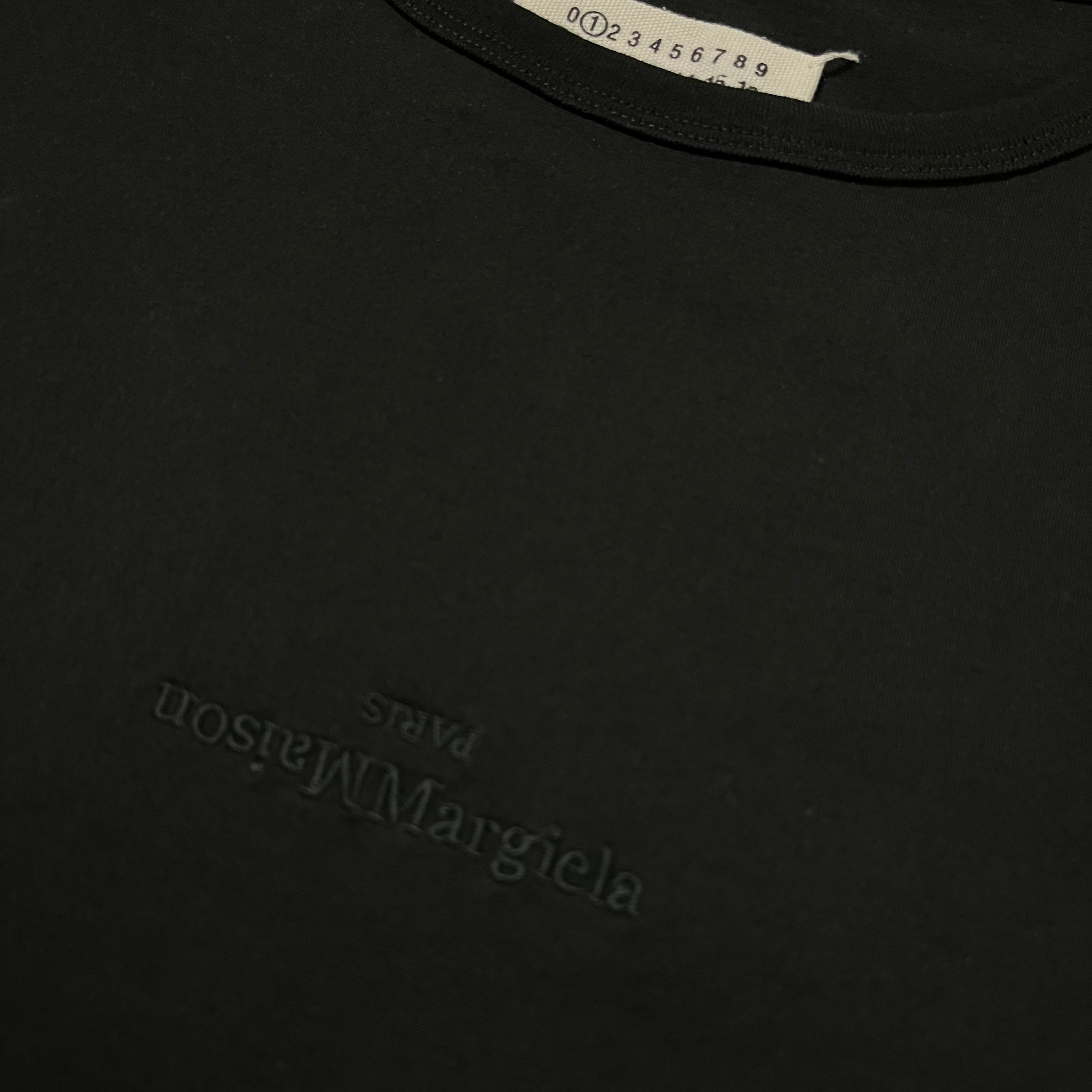 Maison Margiela SS23 Distorted Logo T-shirt featuring a graphic design on soft cotton fabric.