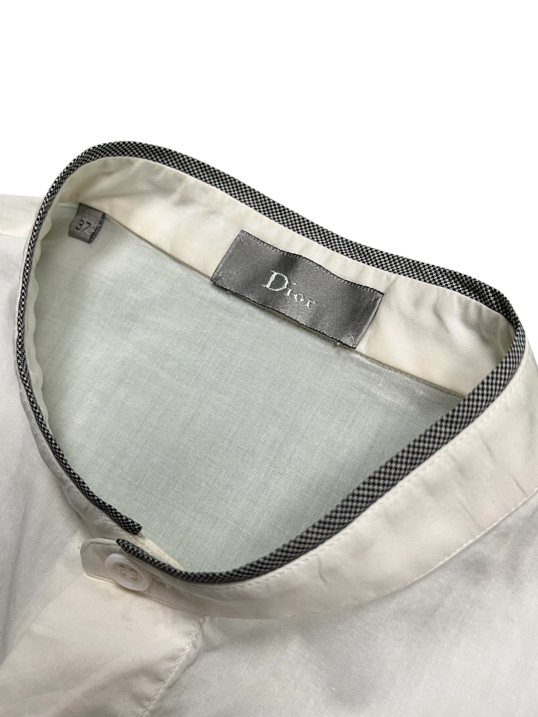 Dior SS07 “We Look Good Together” collarless shirt with sleek design and minimalist style, displayed on a neutral background.