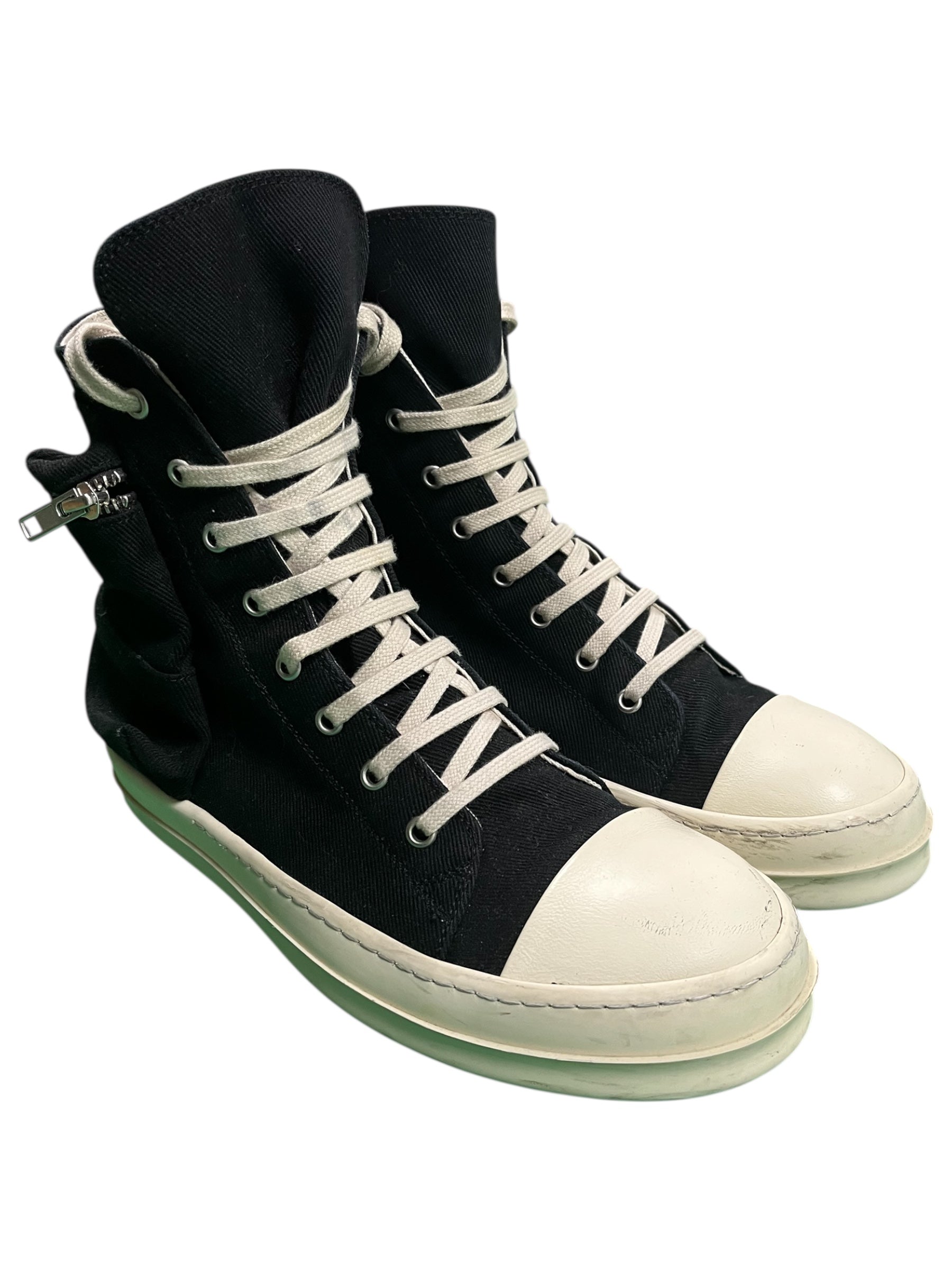 Rick Owens SS22 DRKSHDW Cargo Ramone sneakers, black sneakers with cargo-style design and chunky sole, on a white background.