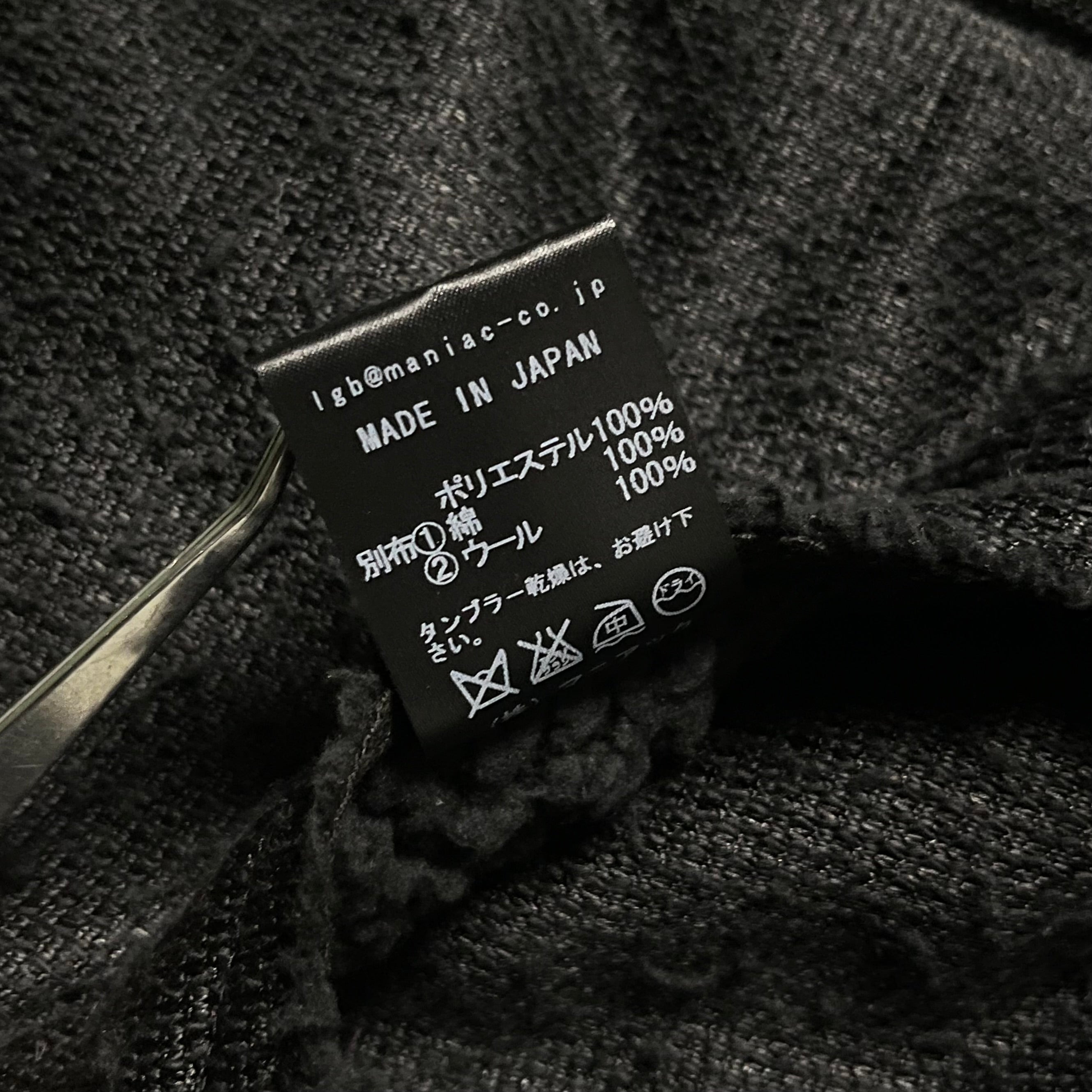 Le Grande Bleu sherpa boxer zip-up hoodie, cozy fleece-lined hoodie with zip front and sporty style, in black fabric.