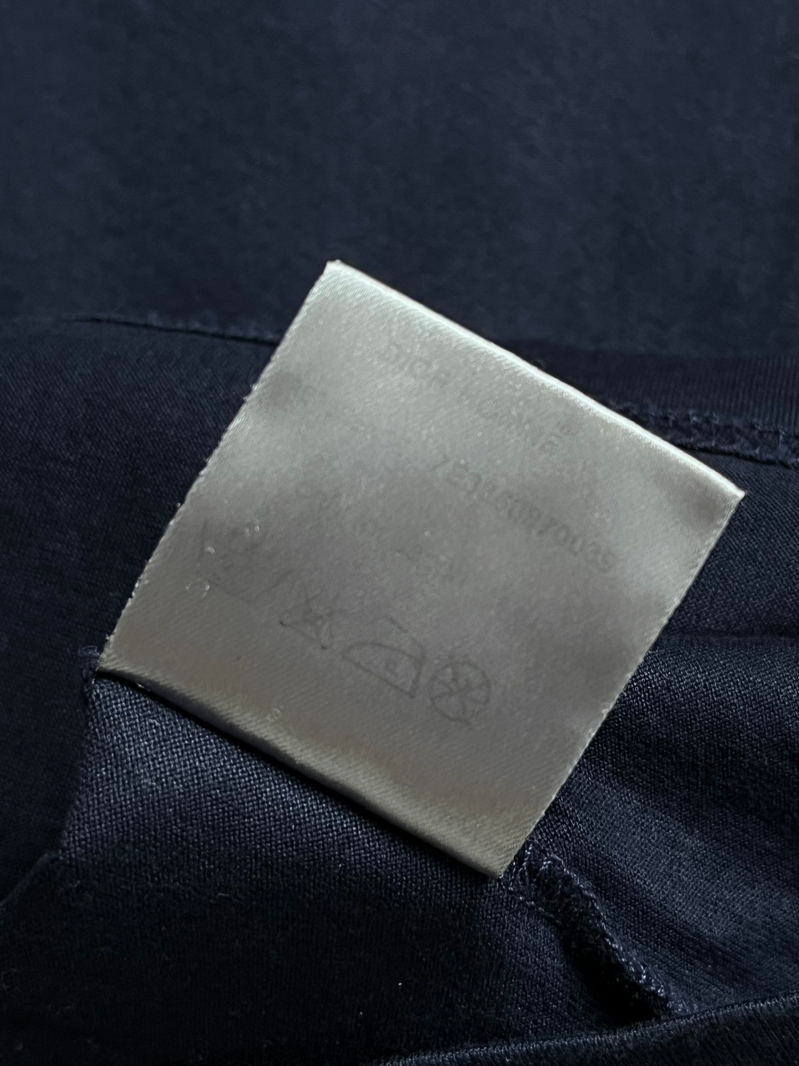 Dior SS07 Two-Tone Pocket Polo Shirt in navy and white with a front pocket, classic polo collar, and short sleeves.