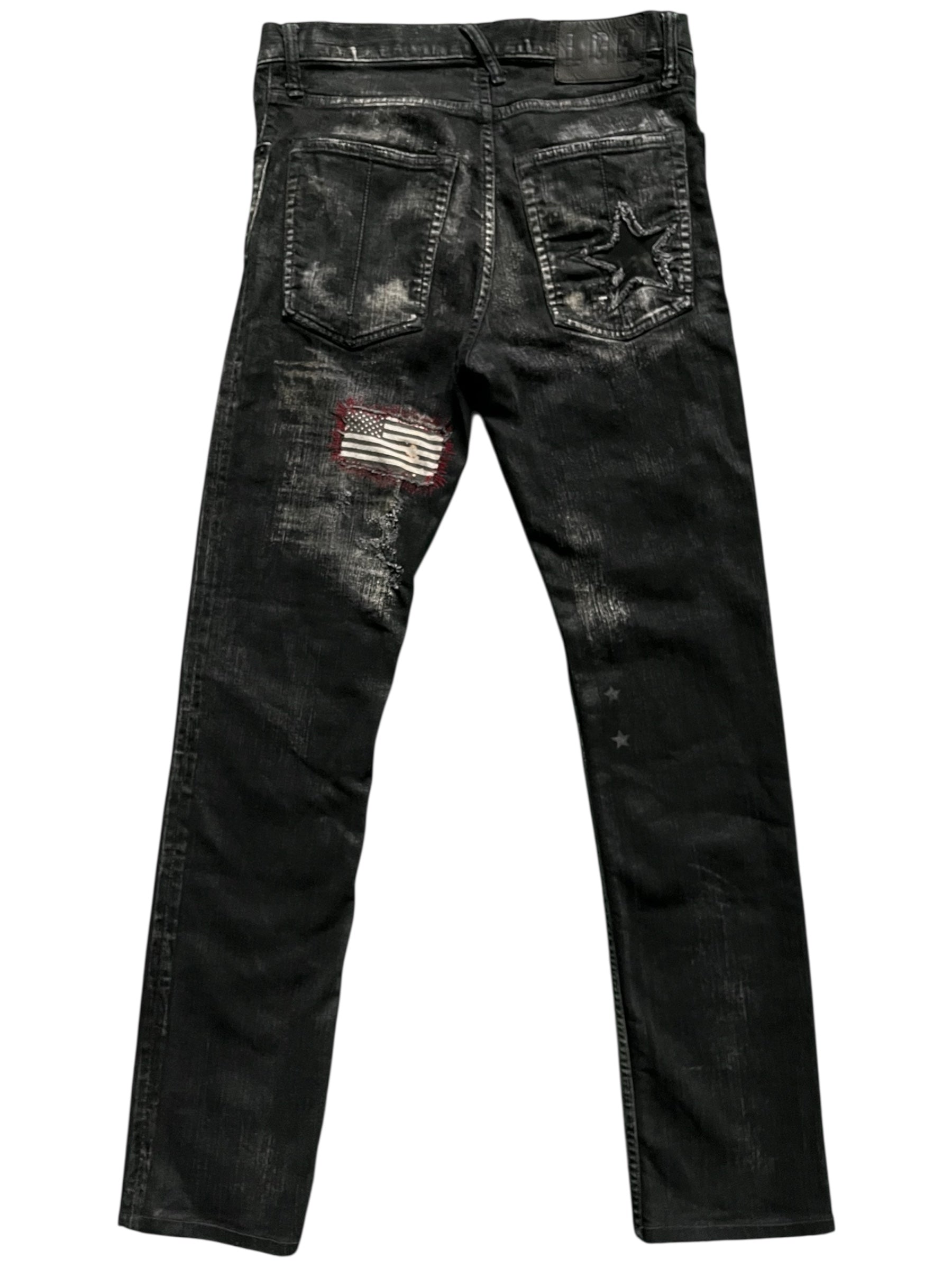 Le Grande Bleu L.G.B distressed denim pants with a 00s wolf cut style, featuring waxed finish and distressed details.