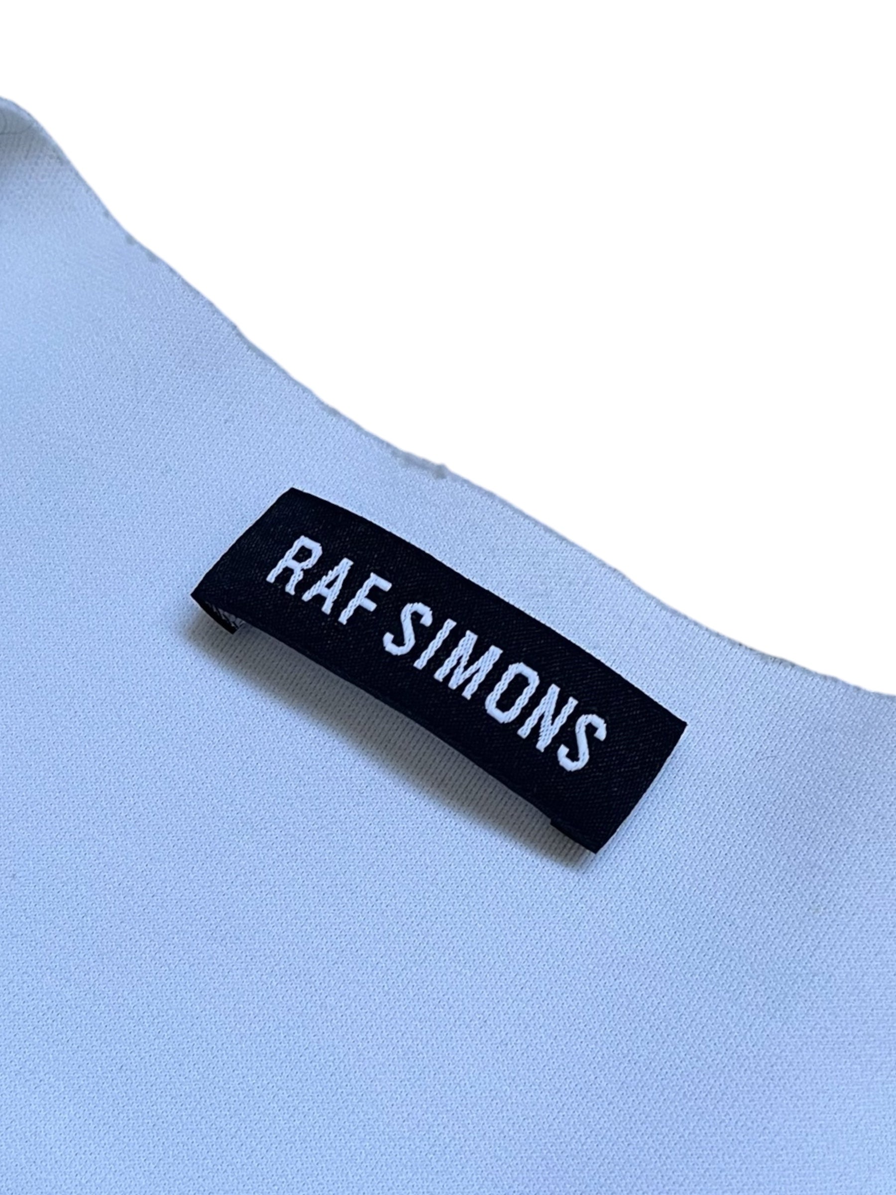 Raf Simons SS14 athletic neoprene T-shirt, black with sleek fit and minimalist design, displayed flat on a white background.