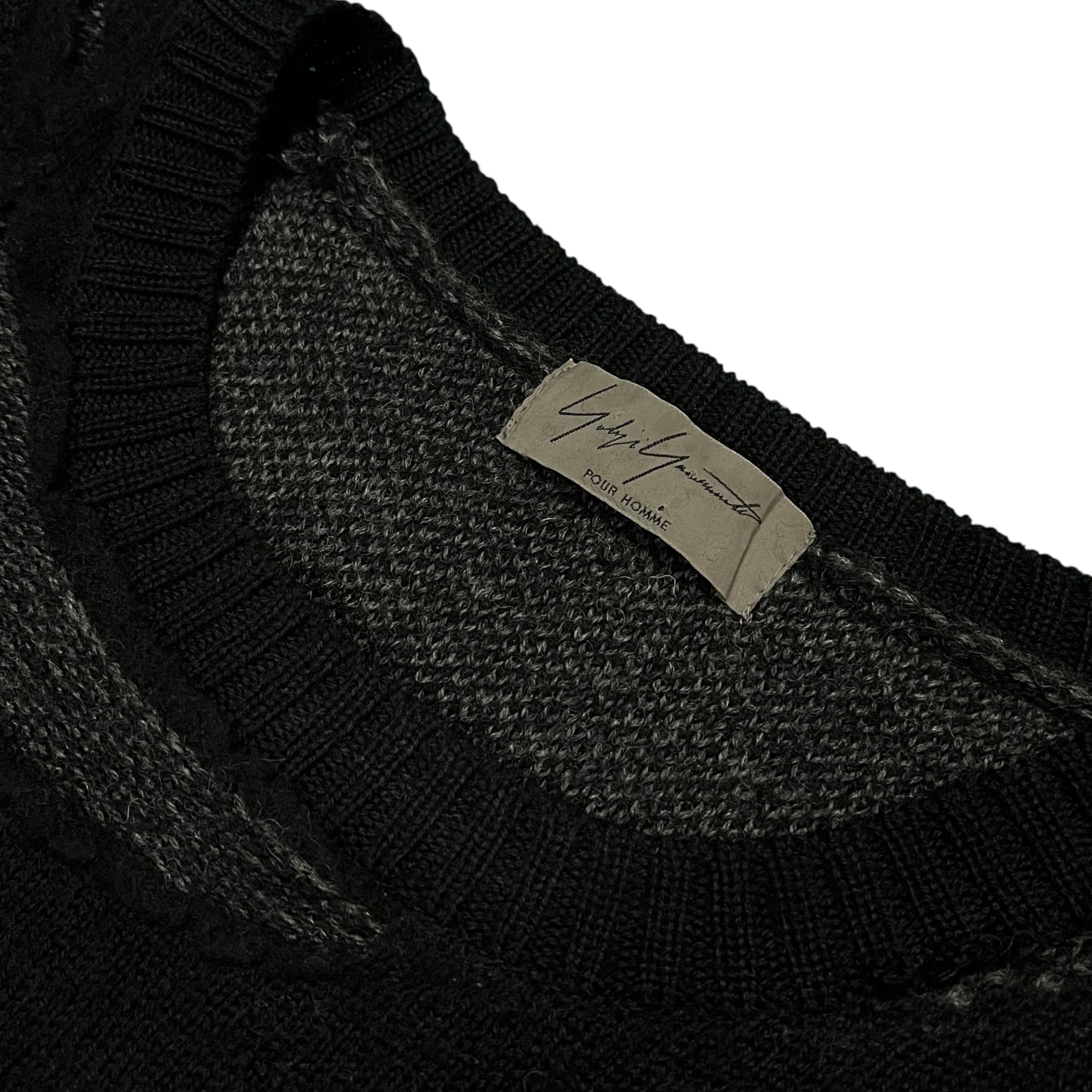 Yohji Yamamoto AW15 distressed wool knit sweater with a textured, worn-in look and intricate knit pattern.