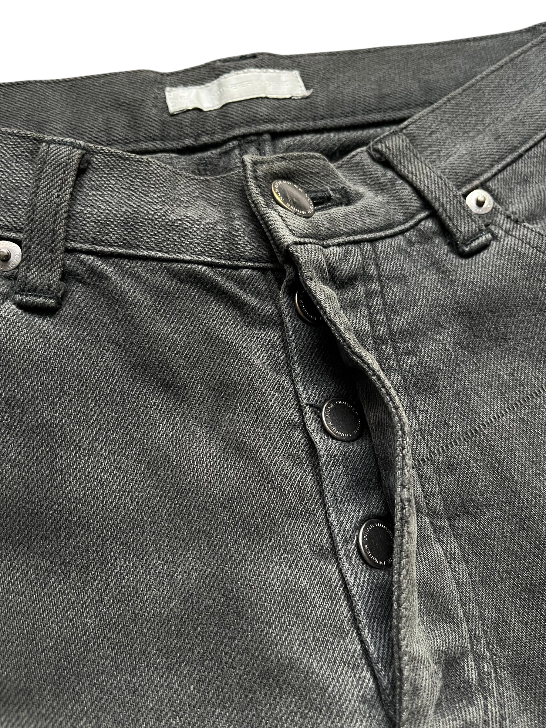 Number (N)ine AW01 "Standards" grey faded denim pants, slim fit with distressed details, displayed on a hanger.