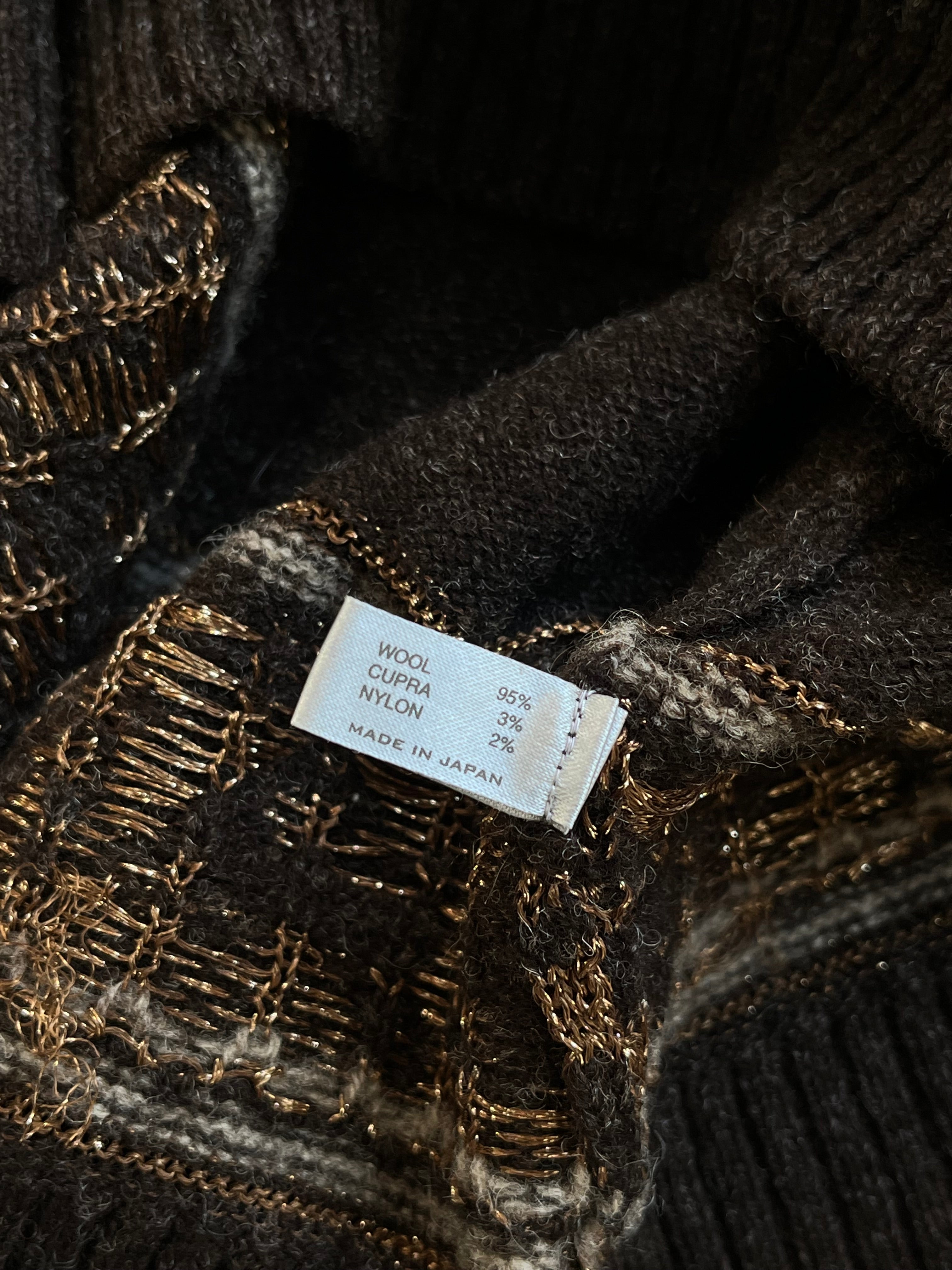 Number (N)ine AW02 Nowhere Man reindeer wool knit sweater featuring detailed reindeer pattern and cozy knit texture.