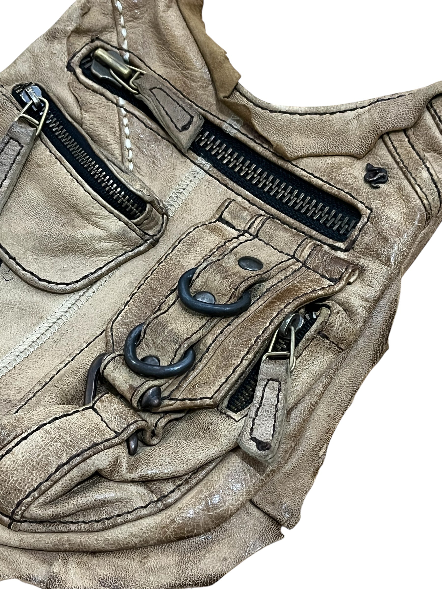 2007 Desert Sand Gun Holster Bag by 14th Addiction attached to belt, showing durable desert sand-colored leather holster for firearm storage.