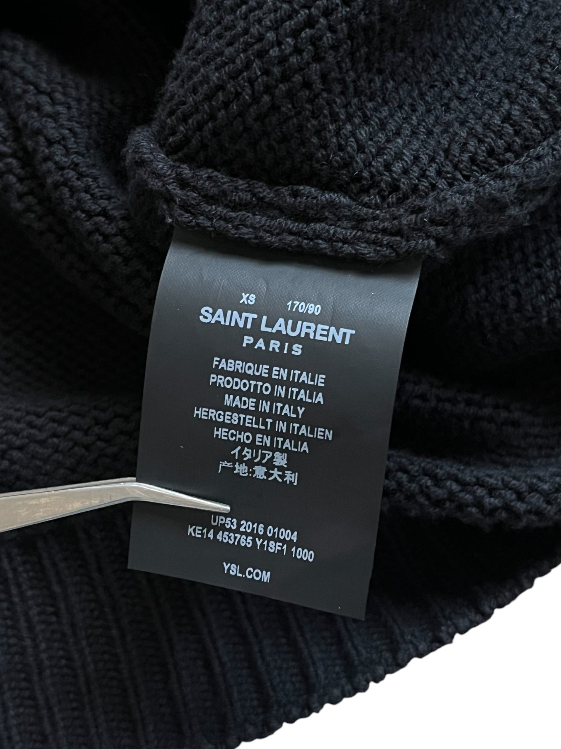 Saint Laurent SS16 black knit sweater, close-up showing soft textured fabric and classic crewneck design.
