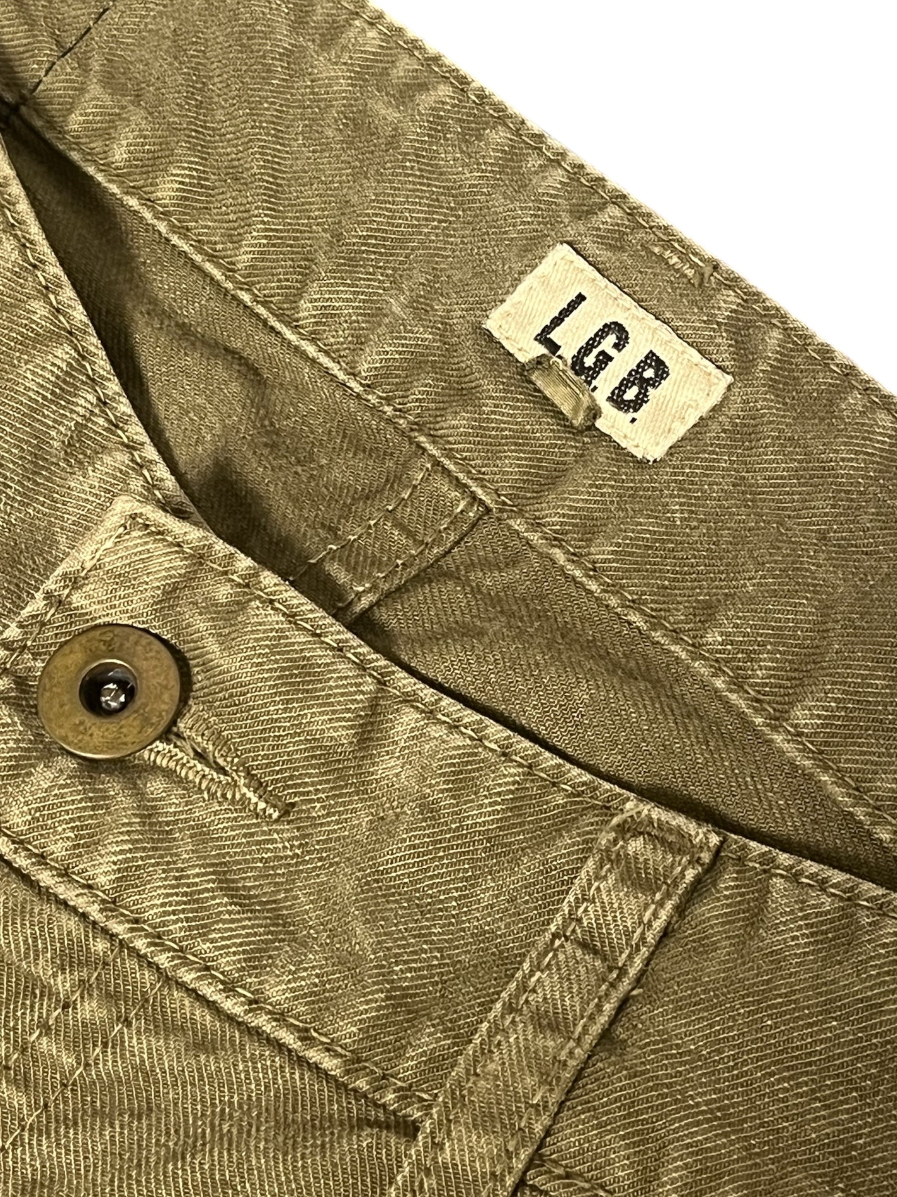 Le Grande Bleu 00s Wolf Flared Zip Pants, stylish black pants with zip details and flared leg design.