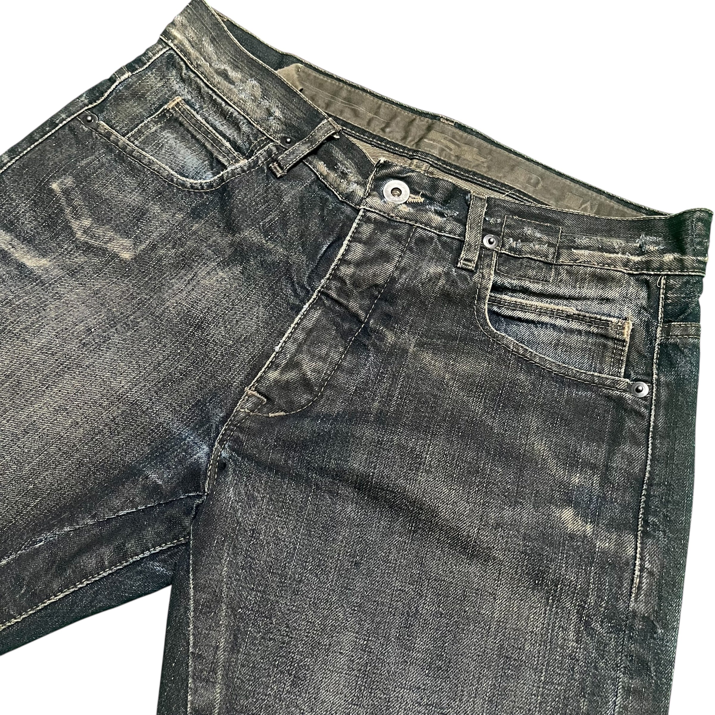 Rick Owens FW08 Stag Clawmark denim pants featuring distressed details and a relaxed fit, displayed on a neutral background.