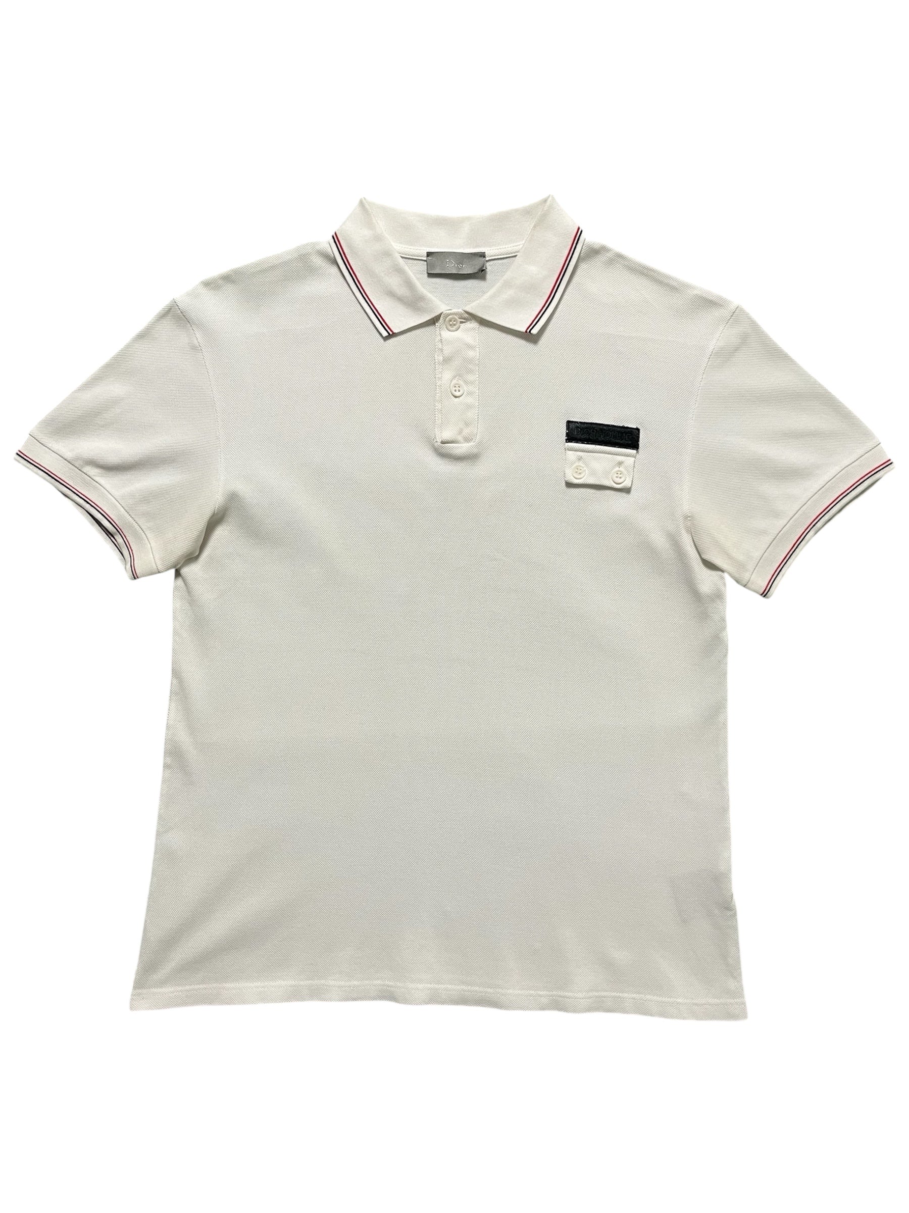 Dior SS07 Patch Polo shirt featuring a classic polo design with colorful patches and a collar, displayed on a neutral background.