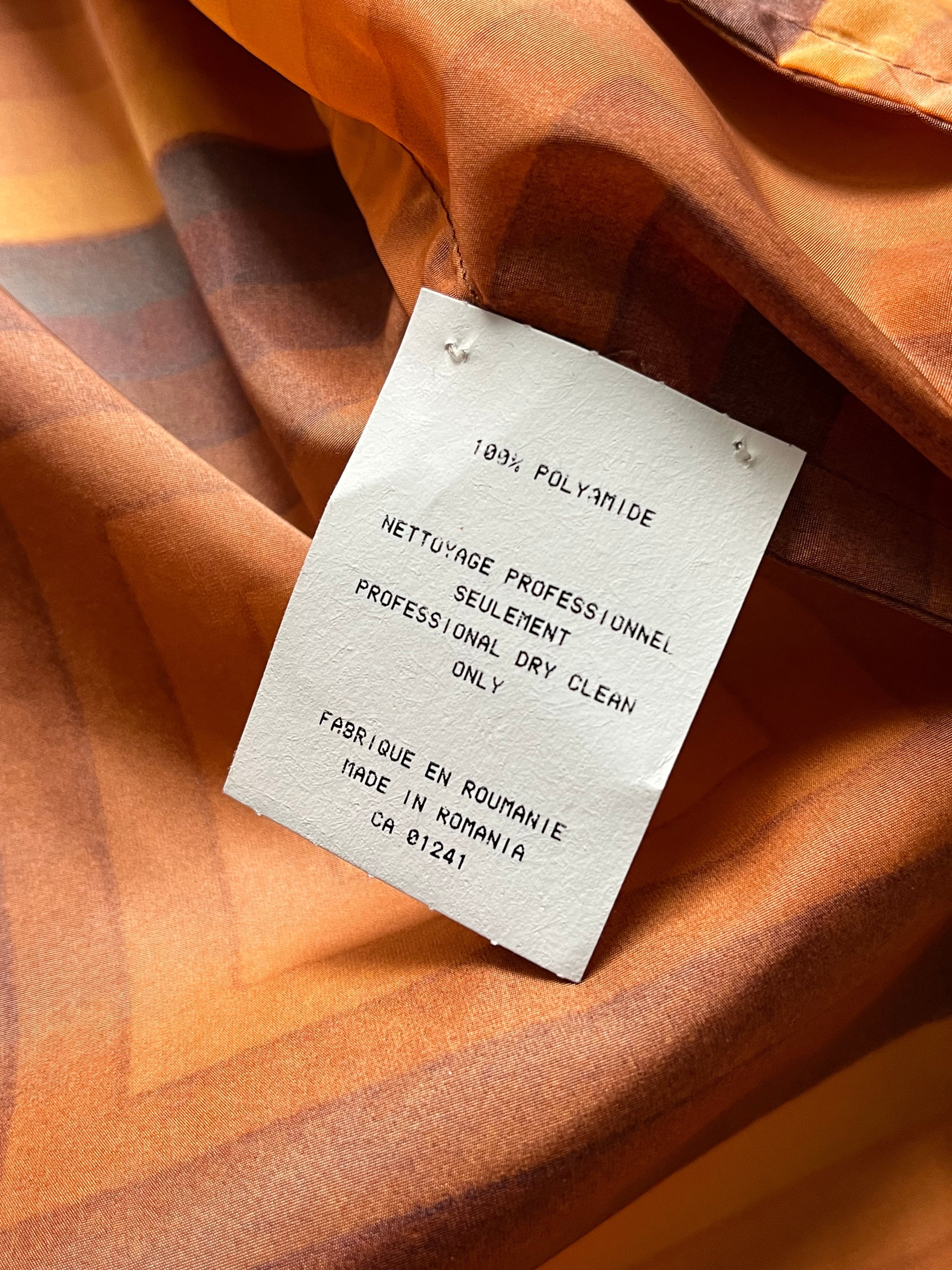 Dries Van Noten SS19 Verner Panton nylon coat in vibrant color, showcasing its sleek design and modern style.