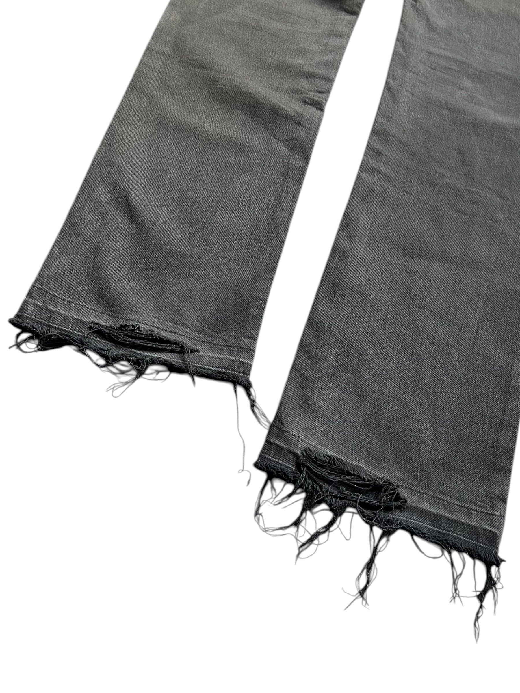 Number (N)ine AW01 "Standards" grey faded denim pants shown in a close-up image of the front and waistband.