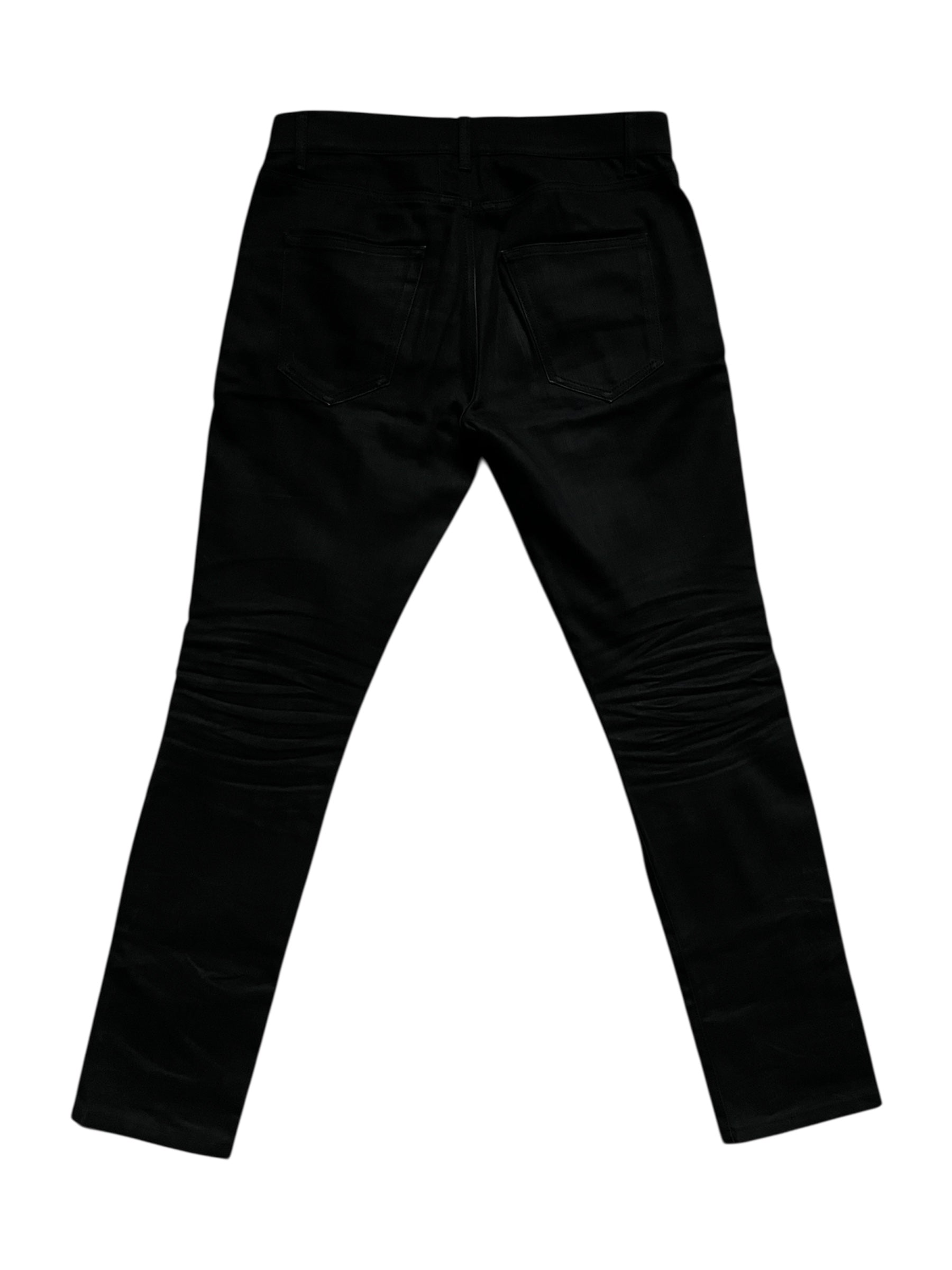 Saint Laurent AW15 Five Zips Biker Denim Pants, close-up showing black denim fabric with five functional zipper details.