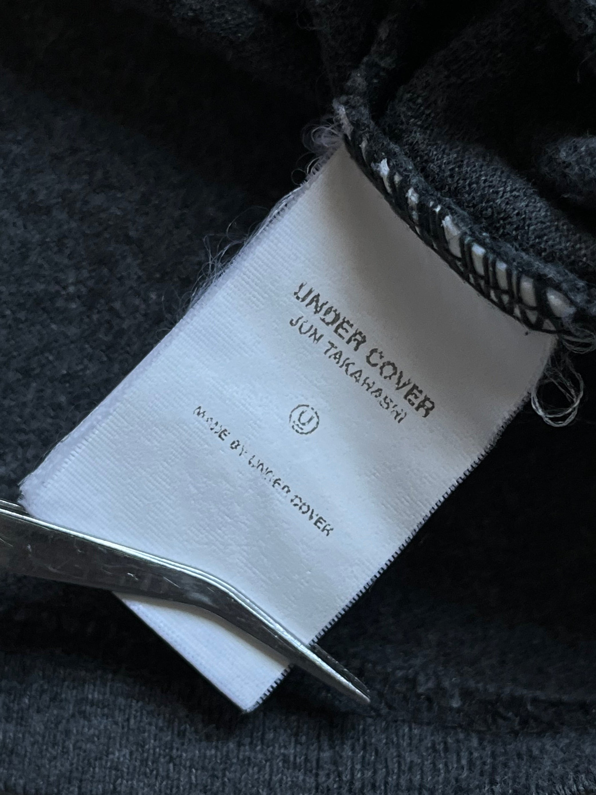 White Undercover SS00 "Teaser" WTAPS Generation F*uck You T-shirt with graphic design, crew neck, and short sleeves.