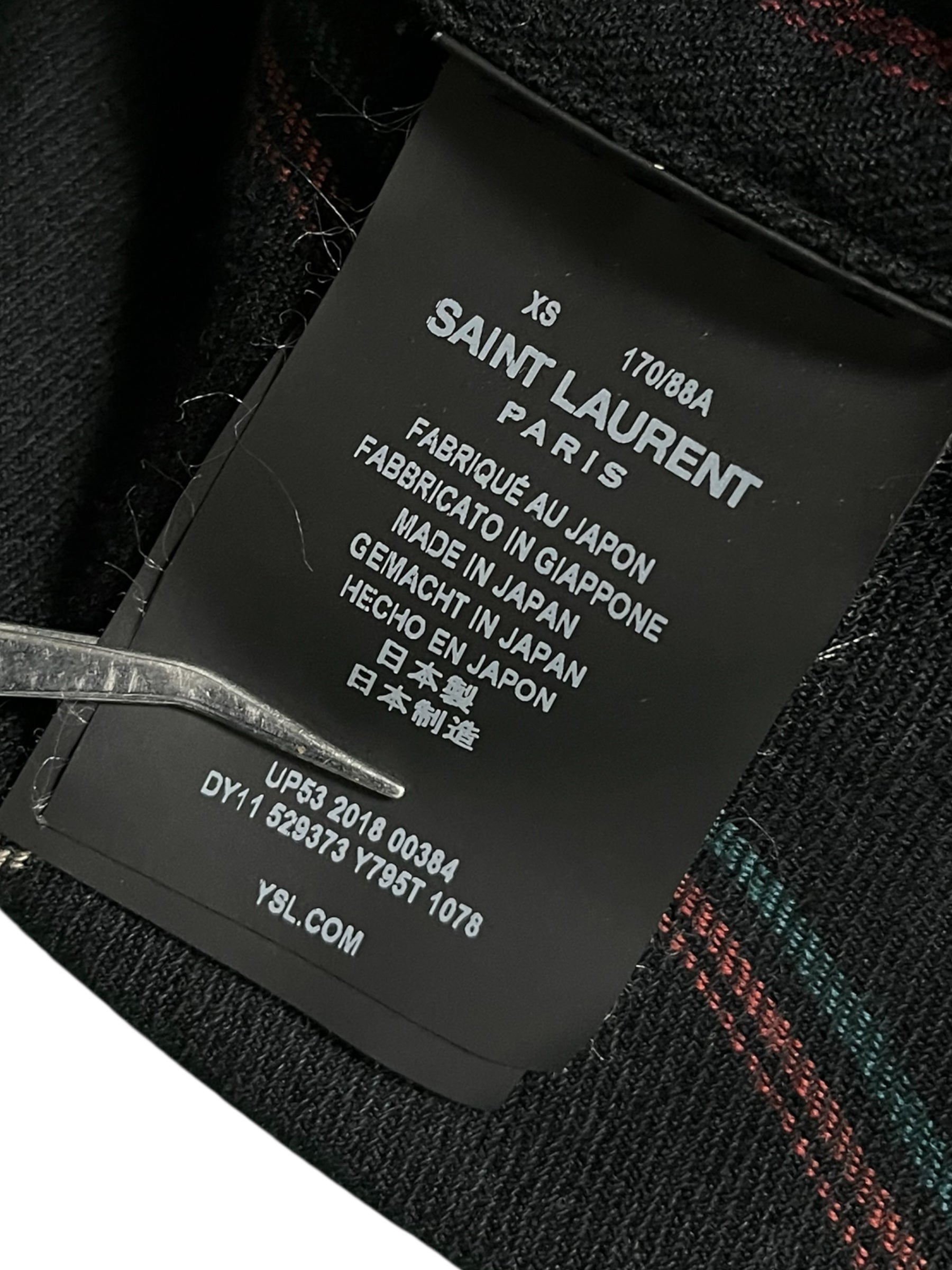 Saint Laurent navy plaid flannel shirt with classic collar and button-down front, showcasing a stylish plaid pattern.
