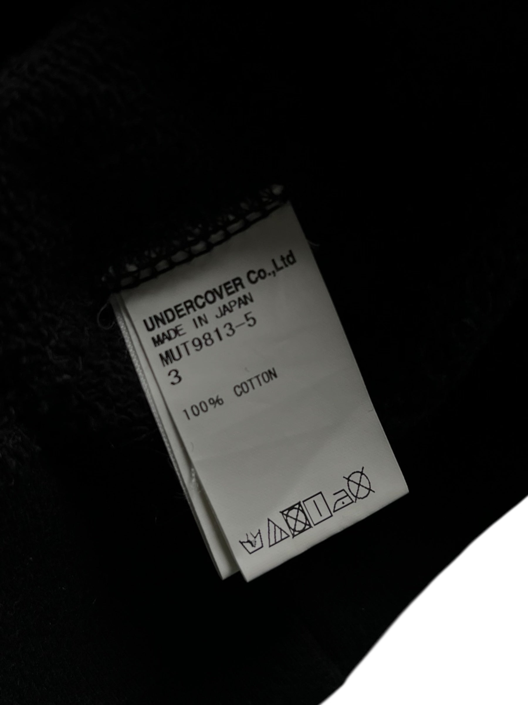 Undercover SS14 Psychocandy crewneck sweatshirt with graphic print, shown in a close-up view of the front design and soft fabric.