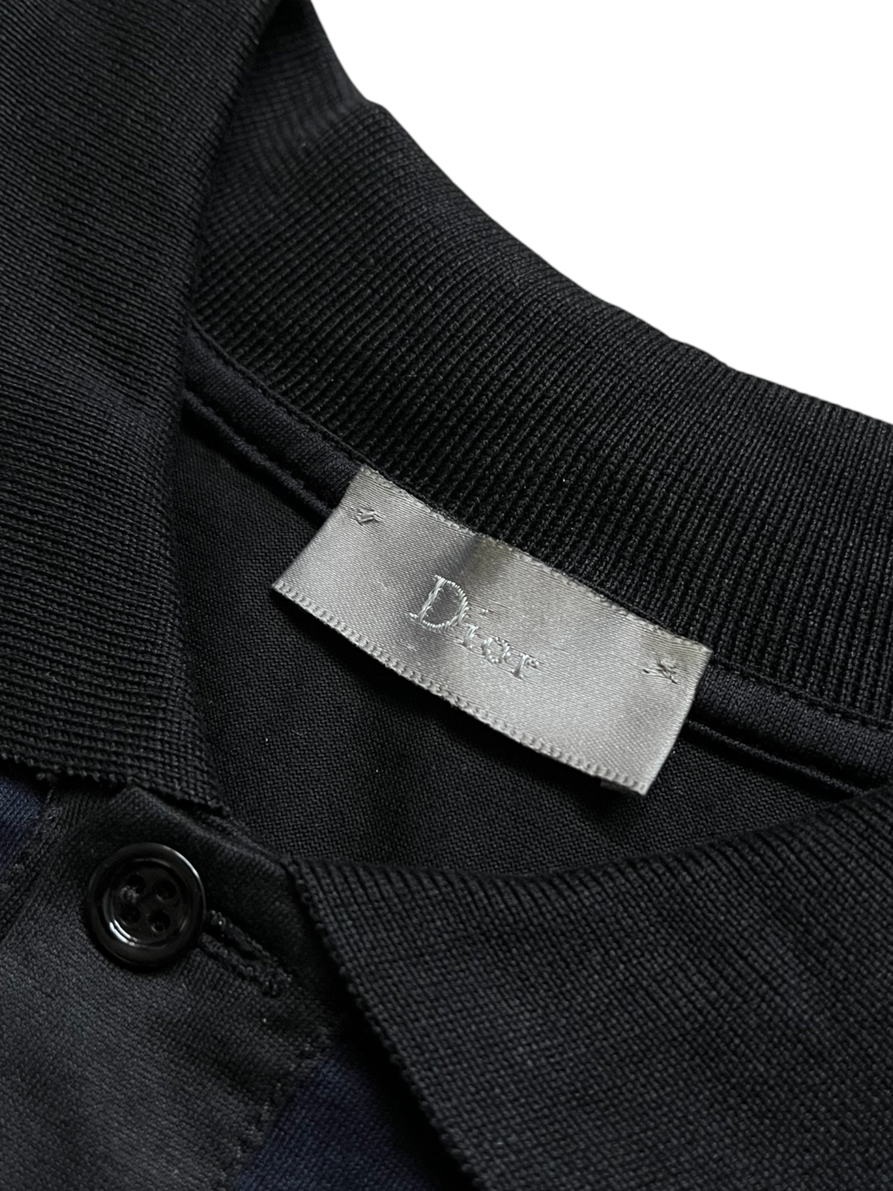 Dior SS07 two-tone pocket polo shirt featuring a classic polo design with contrasting fabric and a chest pocket.