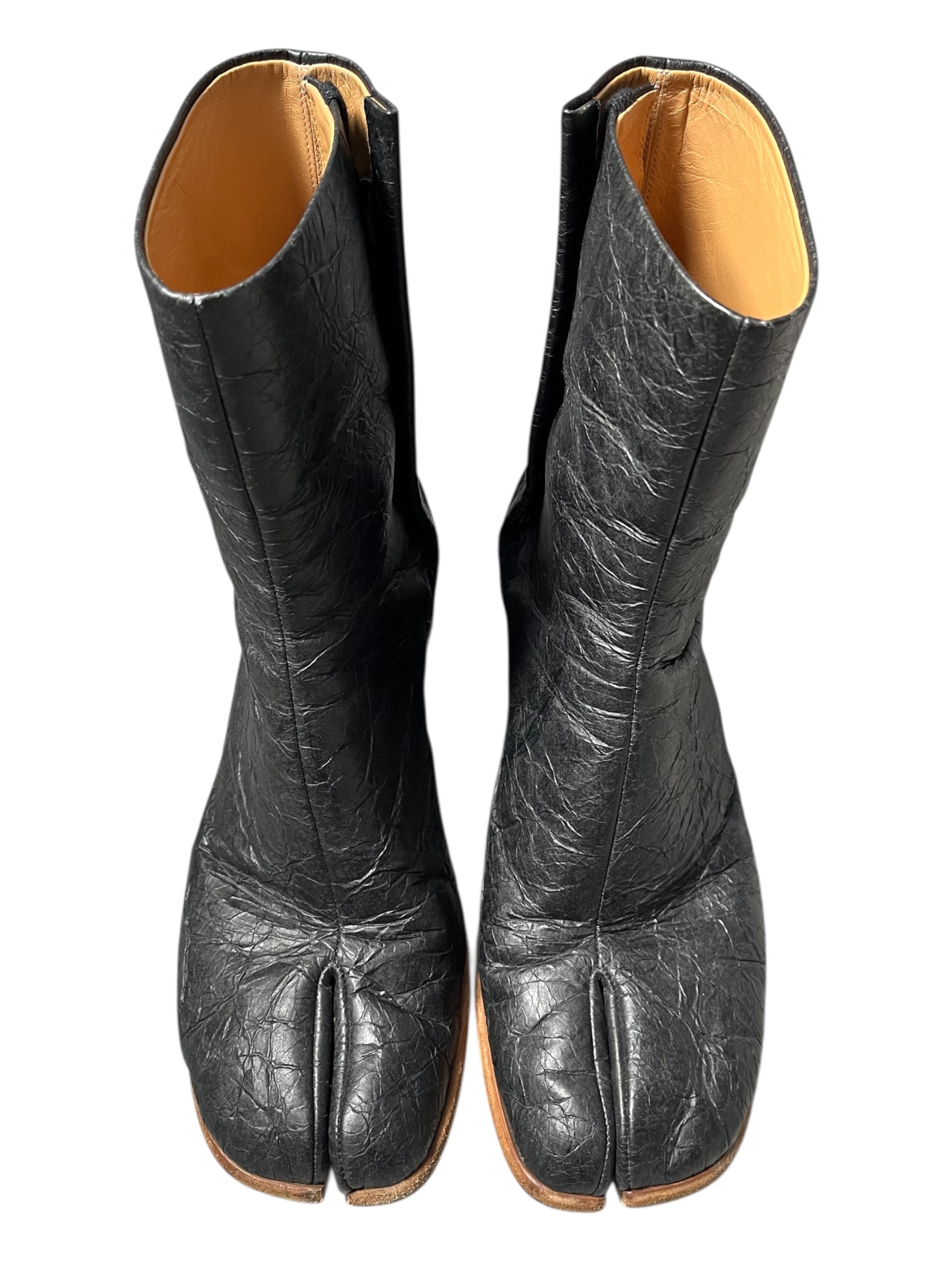 Maison Margiela SS22 crinkled paper effect leather tabi boots, showcasing their unique textured design and distinctive split-toe style.