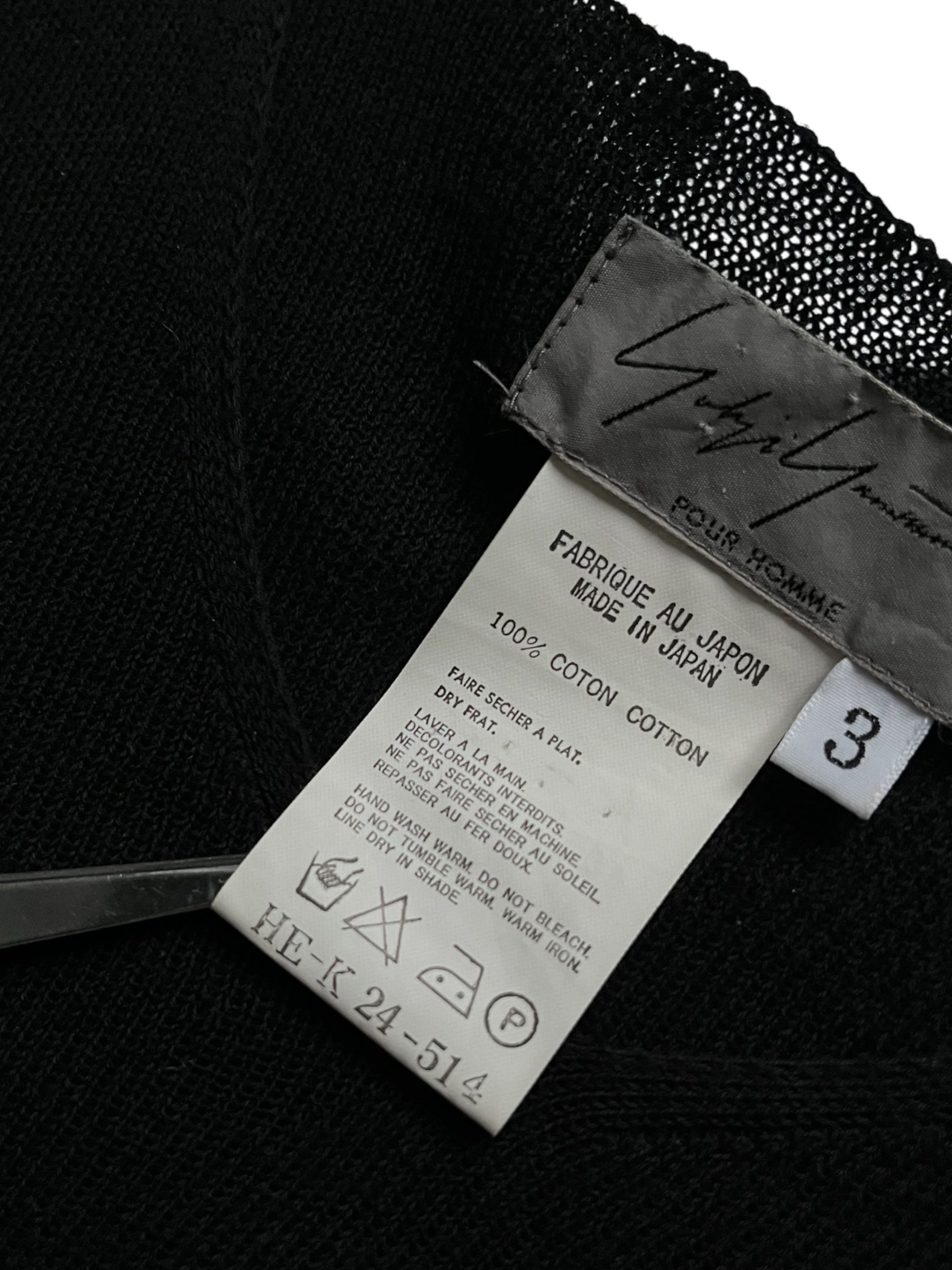 Yohji Yamamoto AW08 knitted tank top in black, close-up of textured knit fabric and sleeveless design.