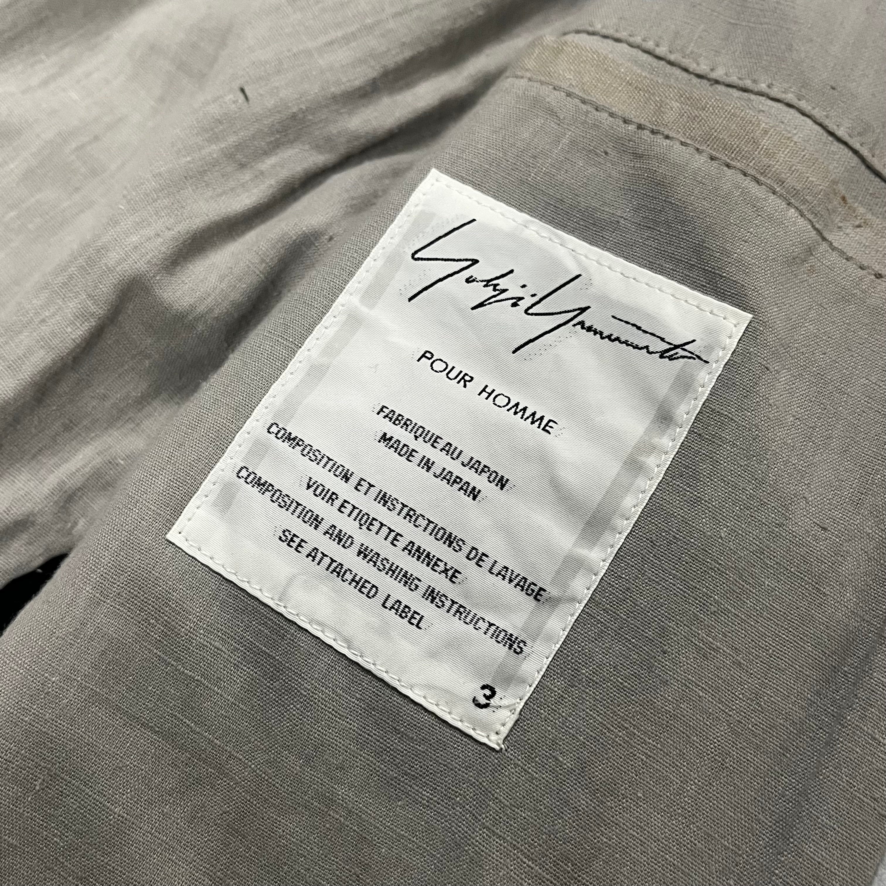 Yohji Yamamoto SS01 runway lambskin jacket in black, featuring a tailored fit and sleek leather design.