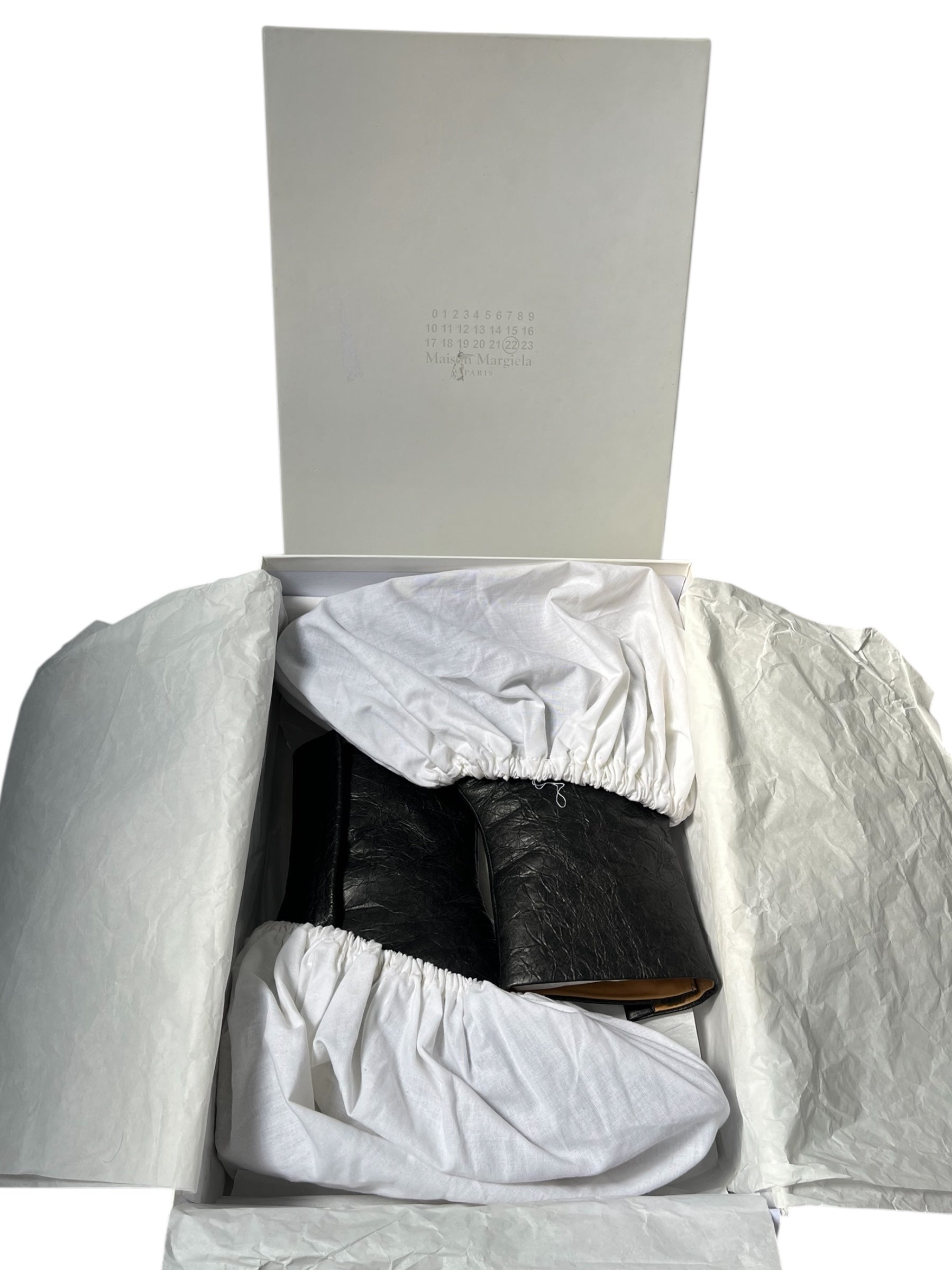 Maison Margiela SS22 crinkled paper effect leather tabi boots, stylish footwear with unique textured design and split toe detail.