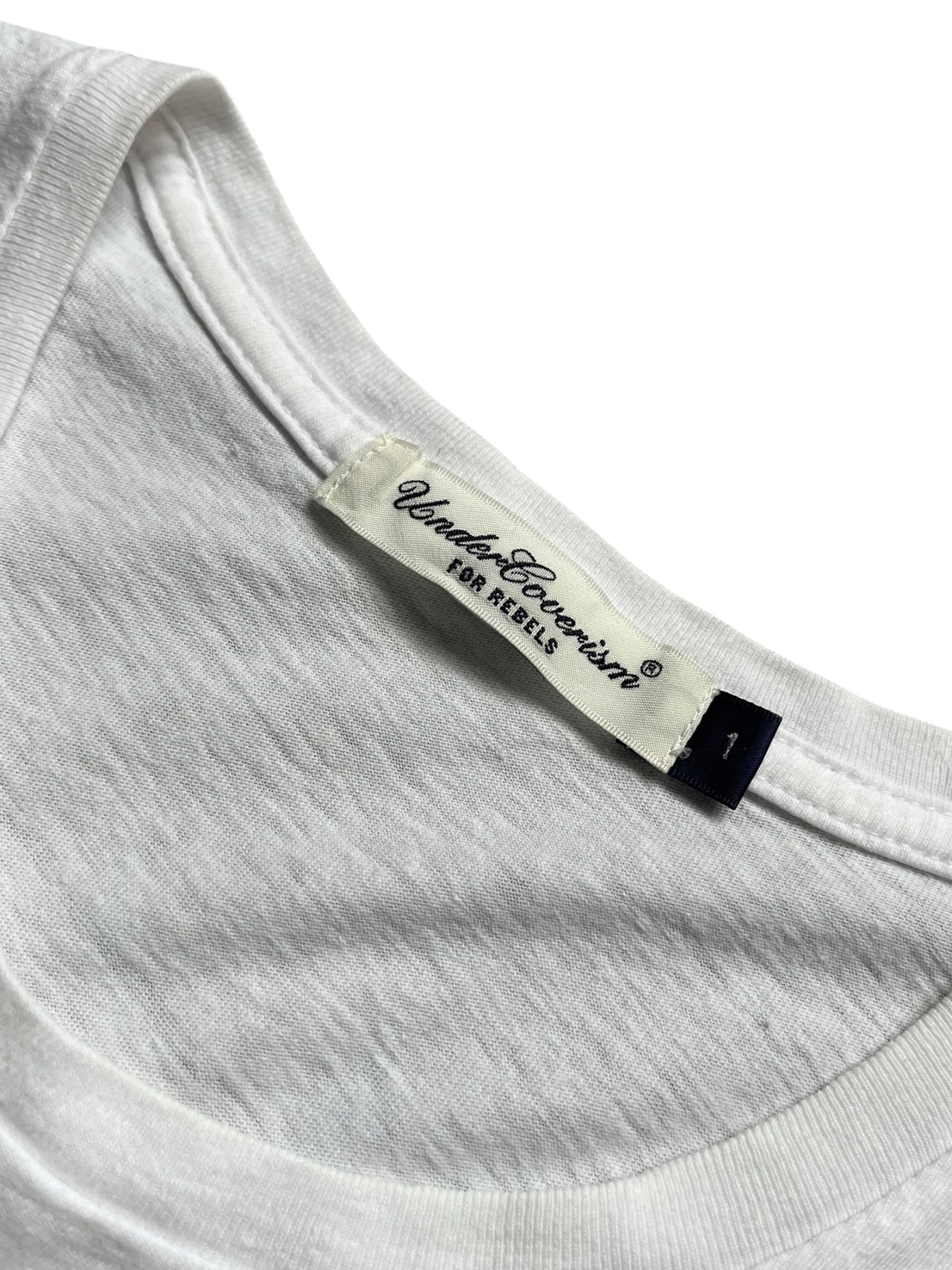Undercover SS12 Openstrings Discotheque T-shirt featuring bold graphic design and casual fit on a white fabric background.