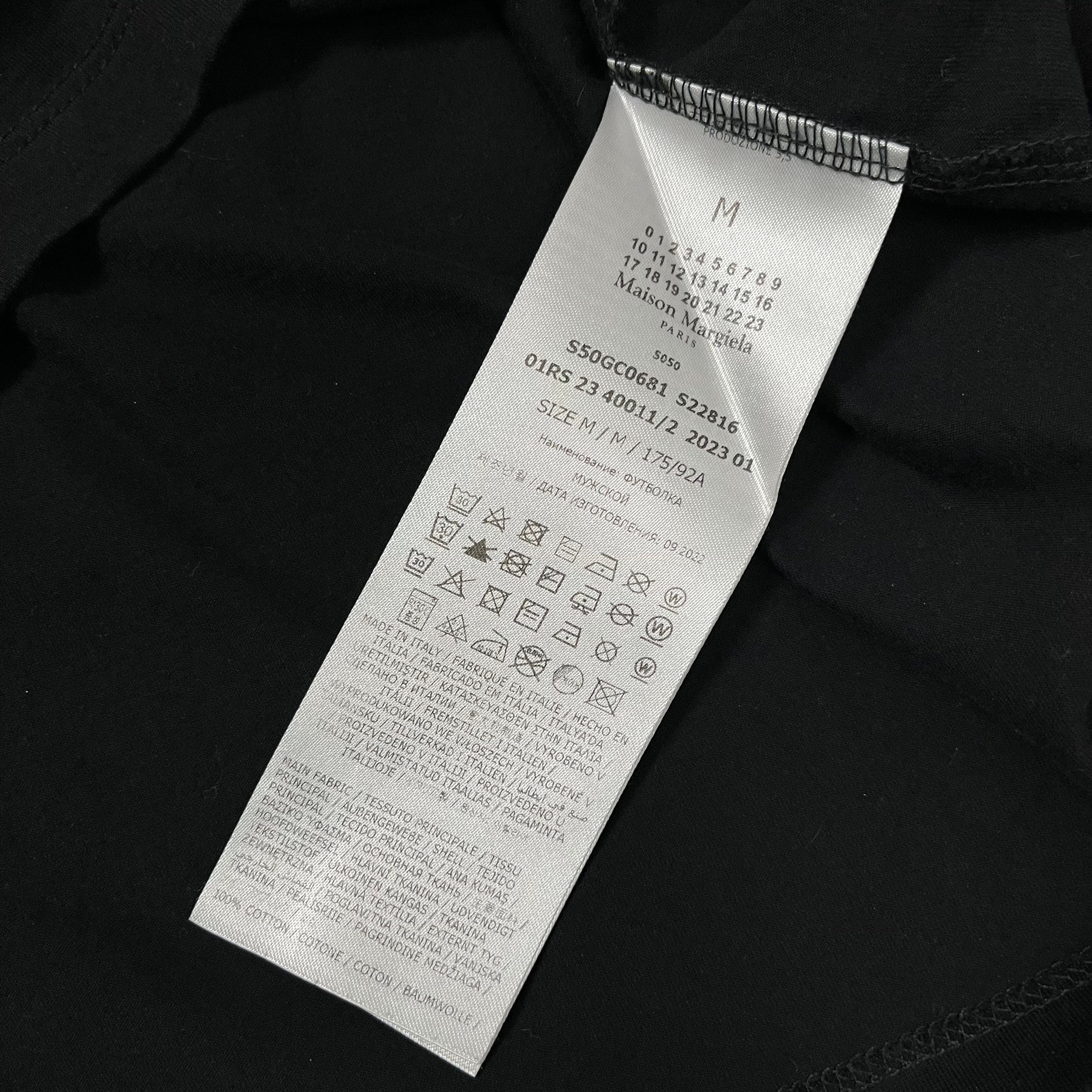 Maison Margiela SS23 Distorted Logo T-shirt featuring a casual fit, graphic logo design, and soft fabric.