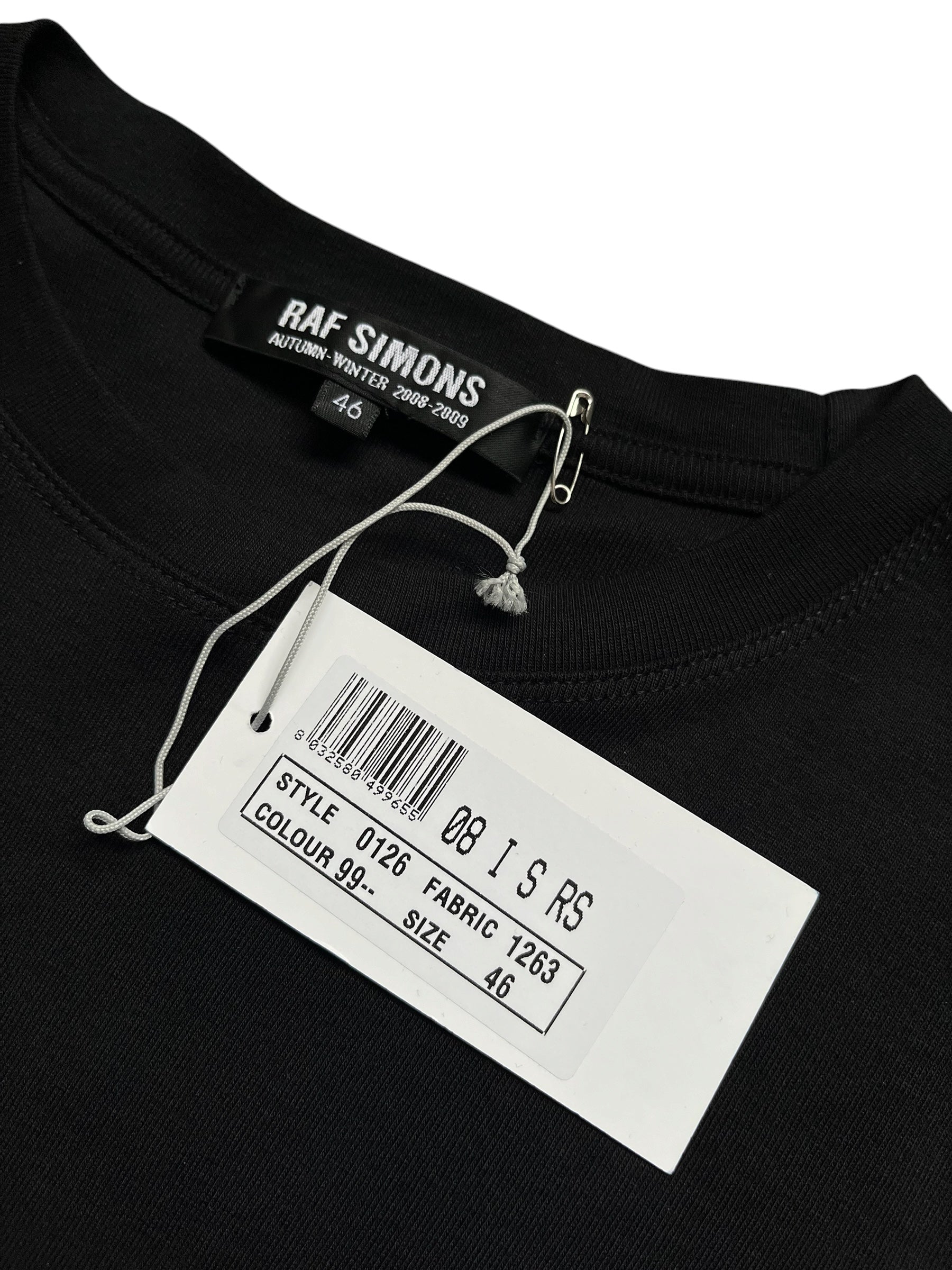 Raf Simons black T-shirt with crew neck and short sleeves, displayed flat on a white background.