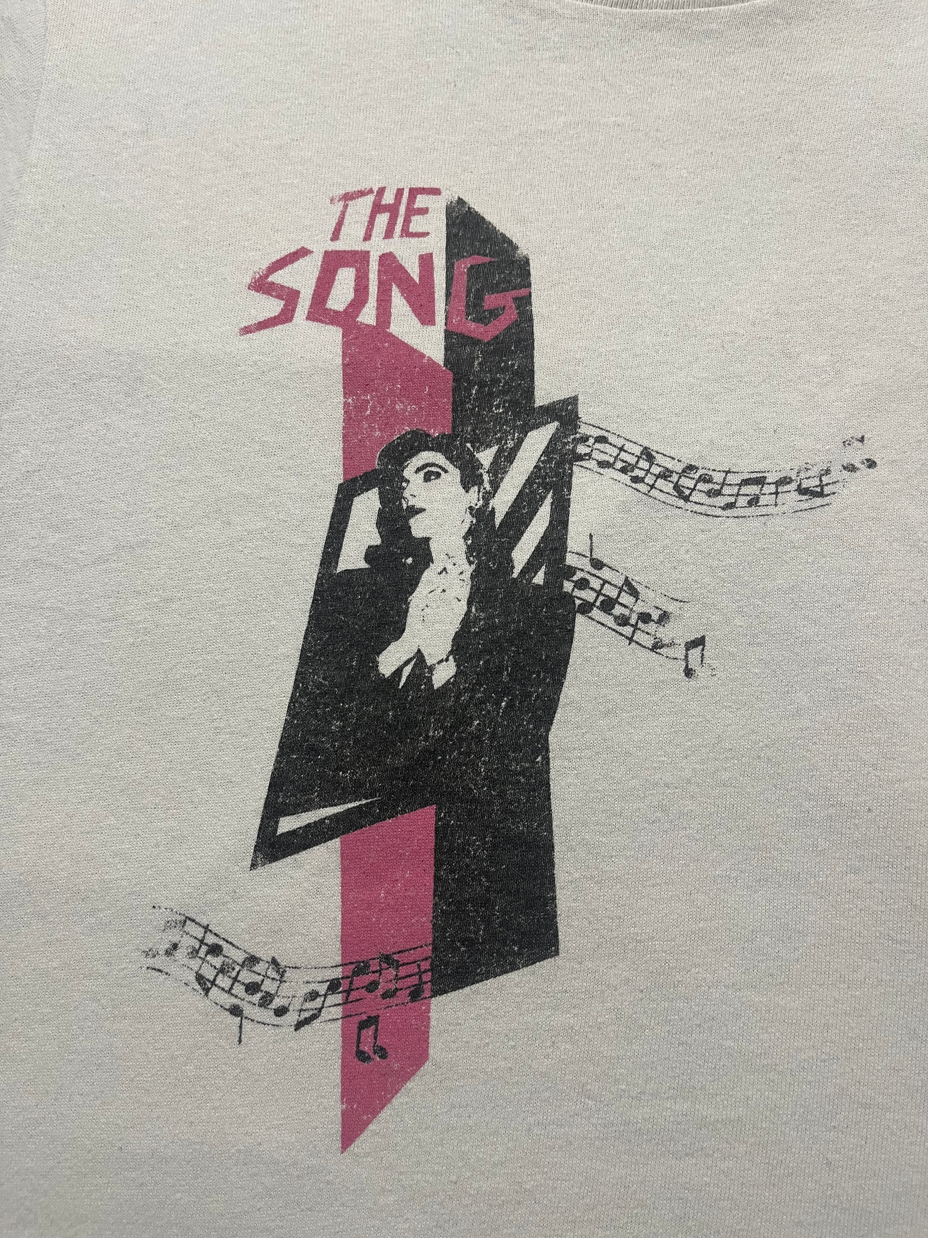 Saint Laurent SS19 The Song T-shirt, white cotton tee with graphic design, relaxed fit, short sleeves, and crew neckline.