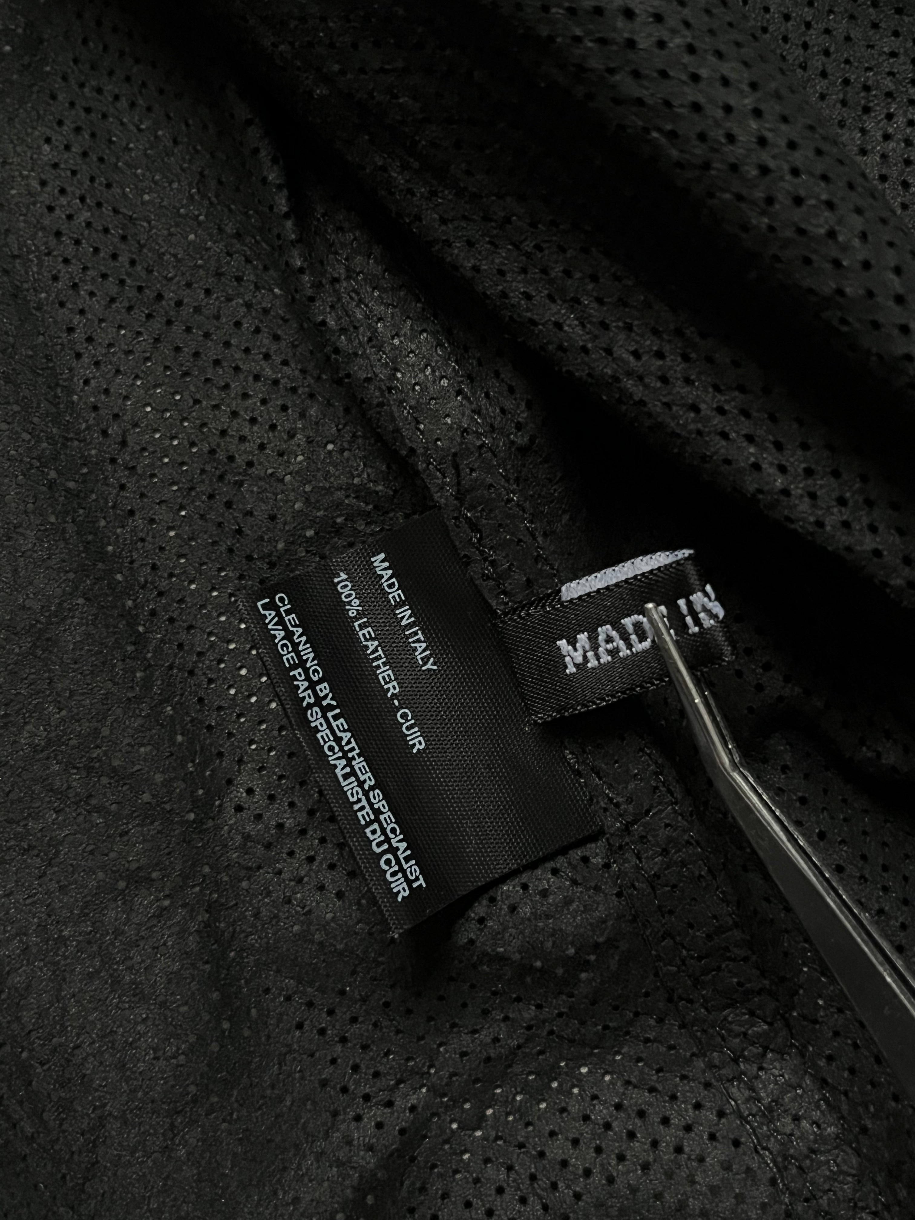 Ann Demeulemeester perforated lambskin blazer with tailored fit and stylish perforated detailing on the front and sleeves.