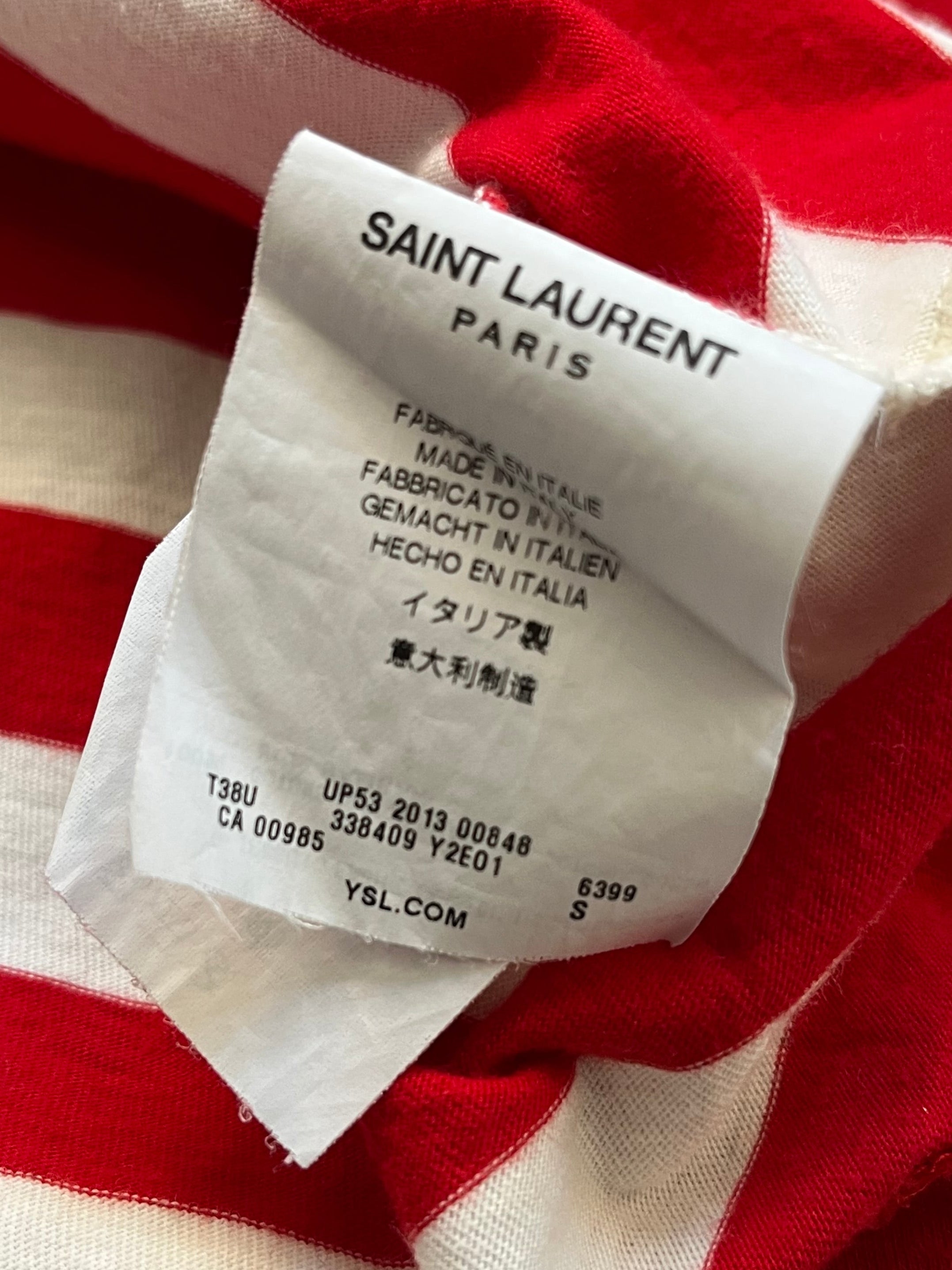 Saint Laurent SS14 striped polo shirt with classic collar and short sleeves, featuring bold horizontal stripe pattern.